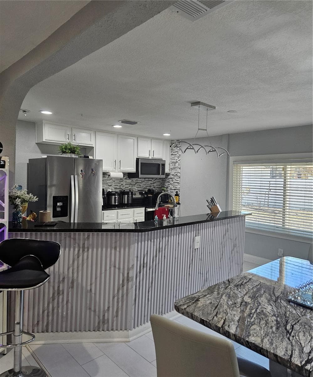 Single Family Residence at 9306 FOREST HILLS DR, TAMPA, photo 5 of 16