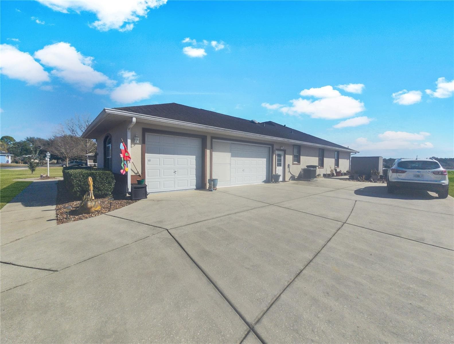 3 Car Garage - Side Entry - 77 HICKORY LOOP, OCALA