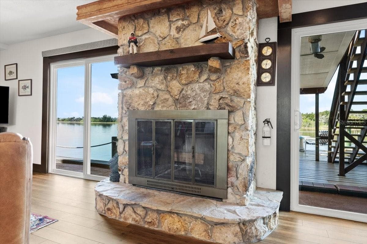Stone fireplace - 2306 JOHN ANDERSON DR, ORMOND BEACH