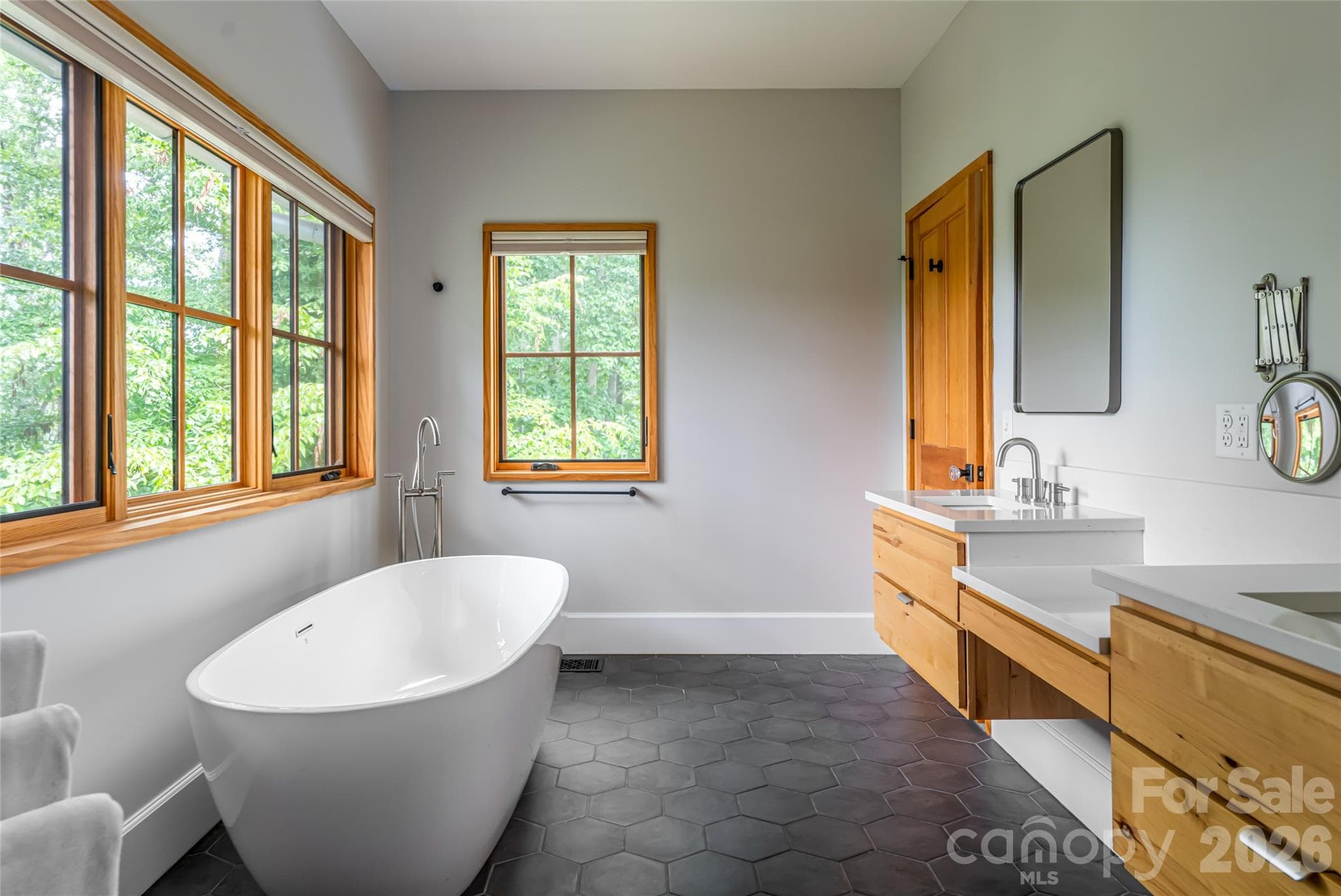 Soaking tub in primary bathroom - 7 Bee Balm Way, Asheville