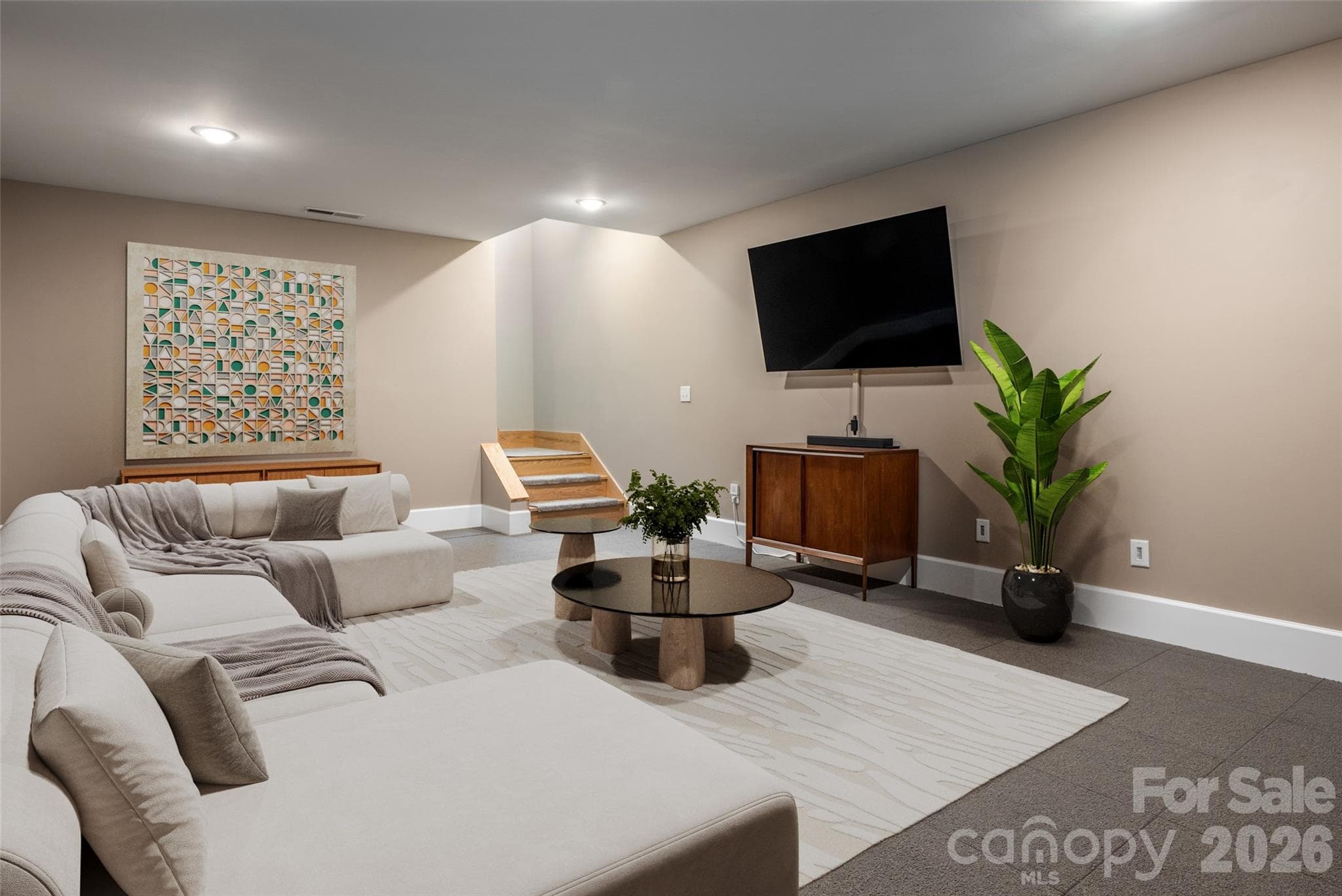 Digitally staged - bonus room in basement - 7 Bee Balm Way, Asheville