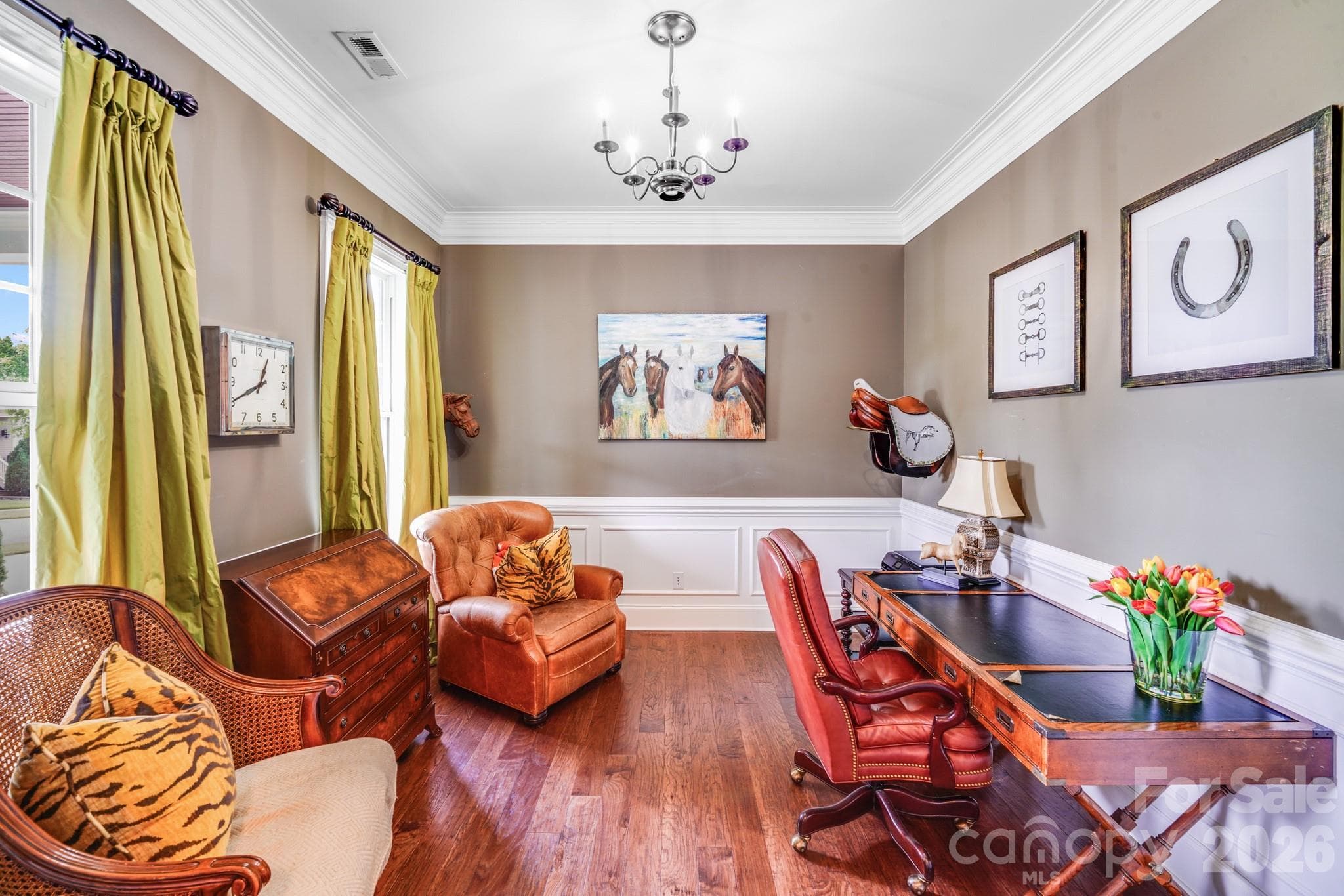 Stylish home office features hardwood floors, classic wainscoting, crown molding and high ceilings - 2702 Arsdale Road, Waxhaw