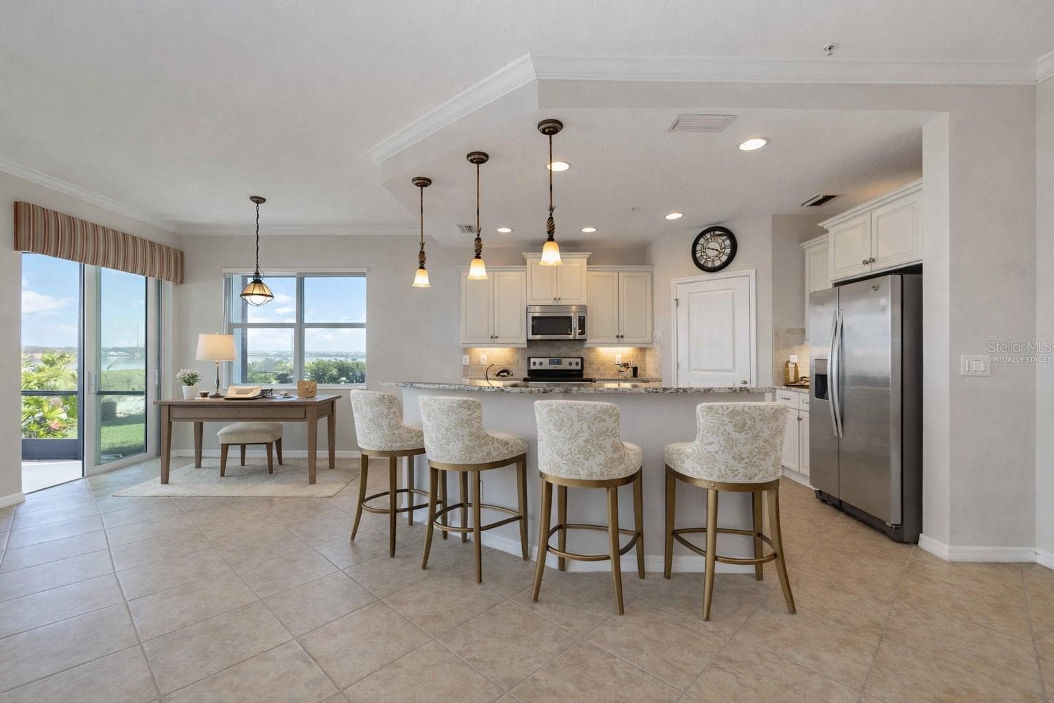 Kitchen and Sitting Area, virtually staged - 1264 RIVERSCAPE ST #B, BRADENTON