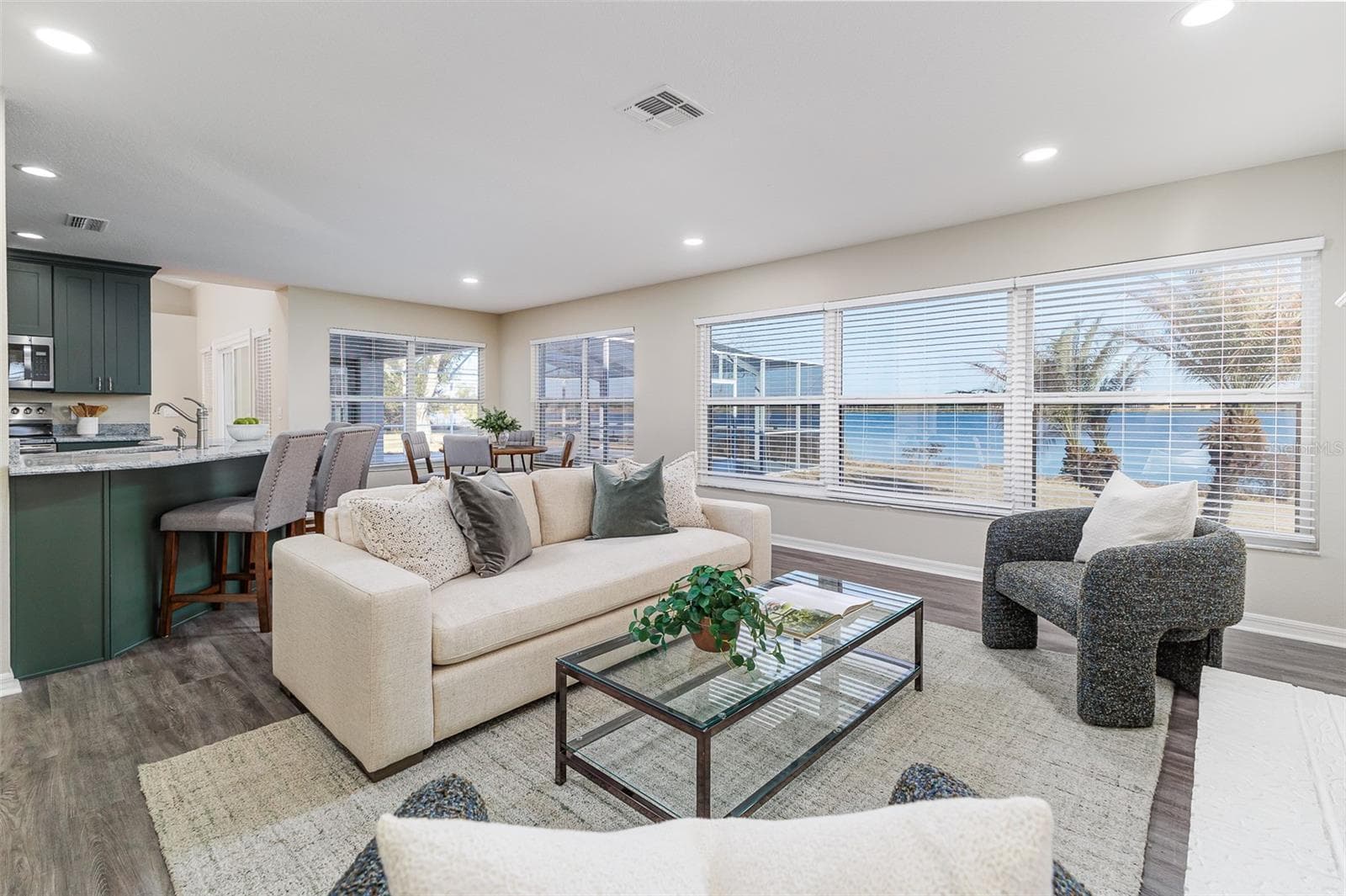 Family Room with Lake  and Pool View - 411 EDGEWATER DR, POLK CITY