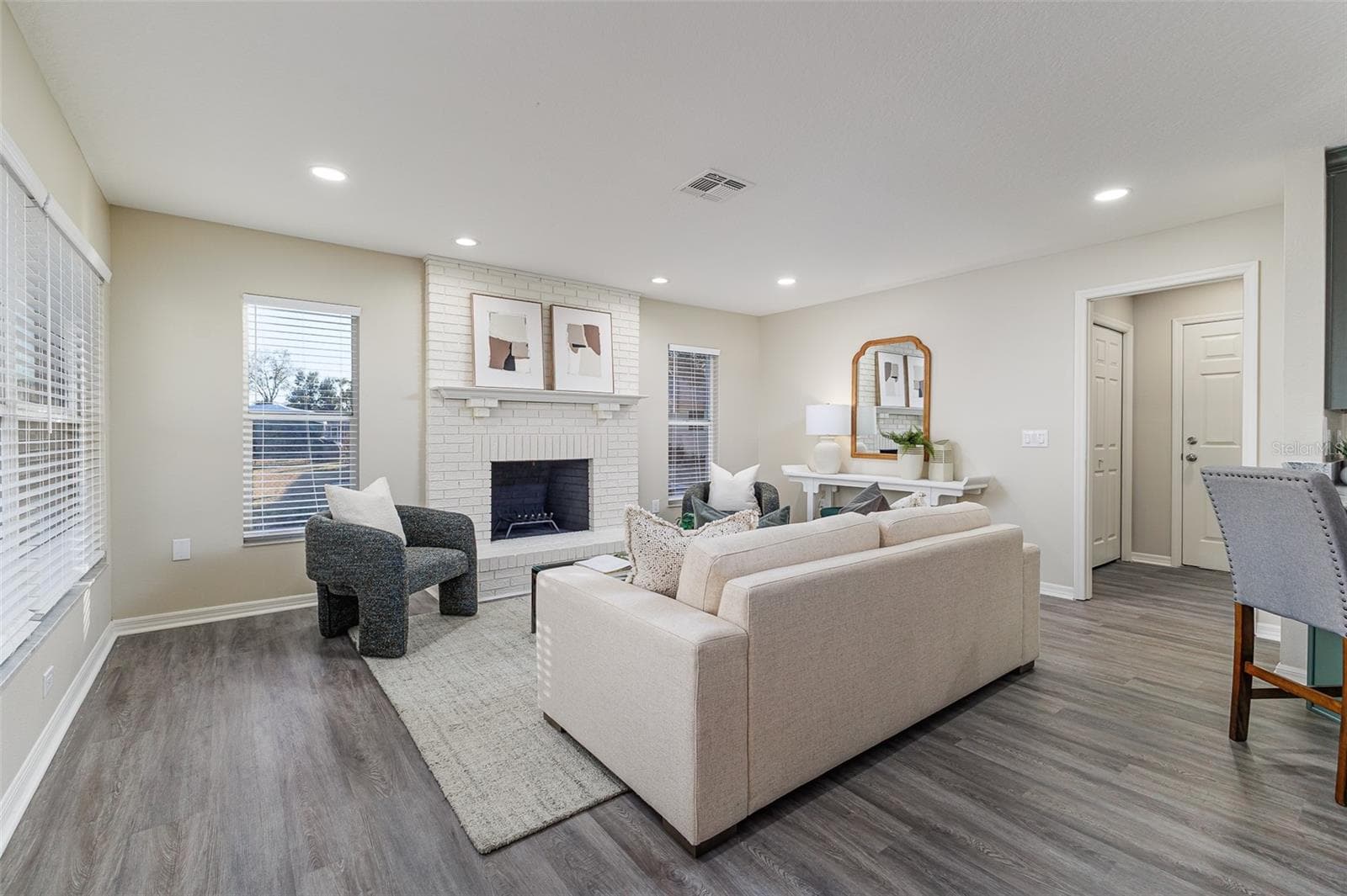 Family Room with Wood Burning Fireplace with Lake Views - 411 EDGEWATER DR, POLK CITY