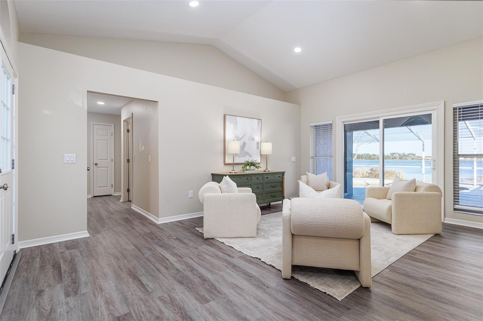 Living Room with view of Pool and Lake Agnes - 411 EDGEWATER DR, POLK CITY