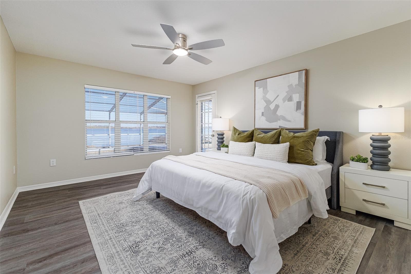 Primary Bedroom with view of Pool and Lake Agnes, with private entrance to pool - 411 EDGEWATER DR, POLK CITY