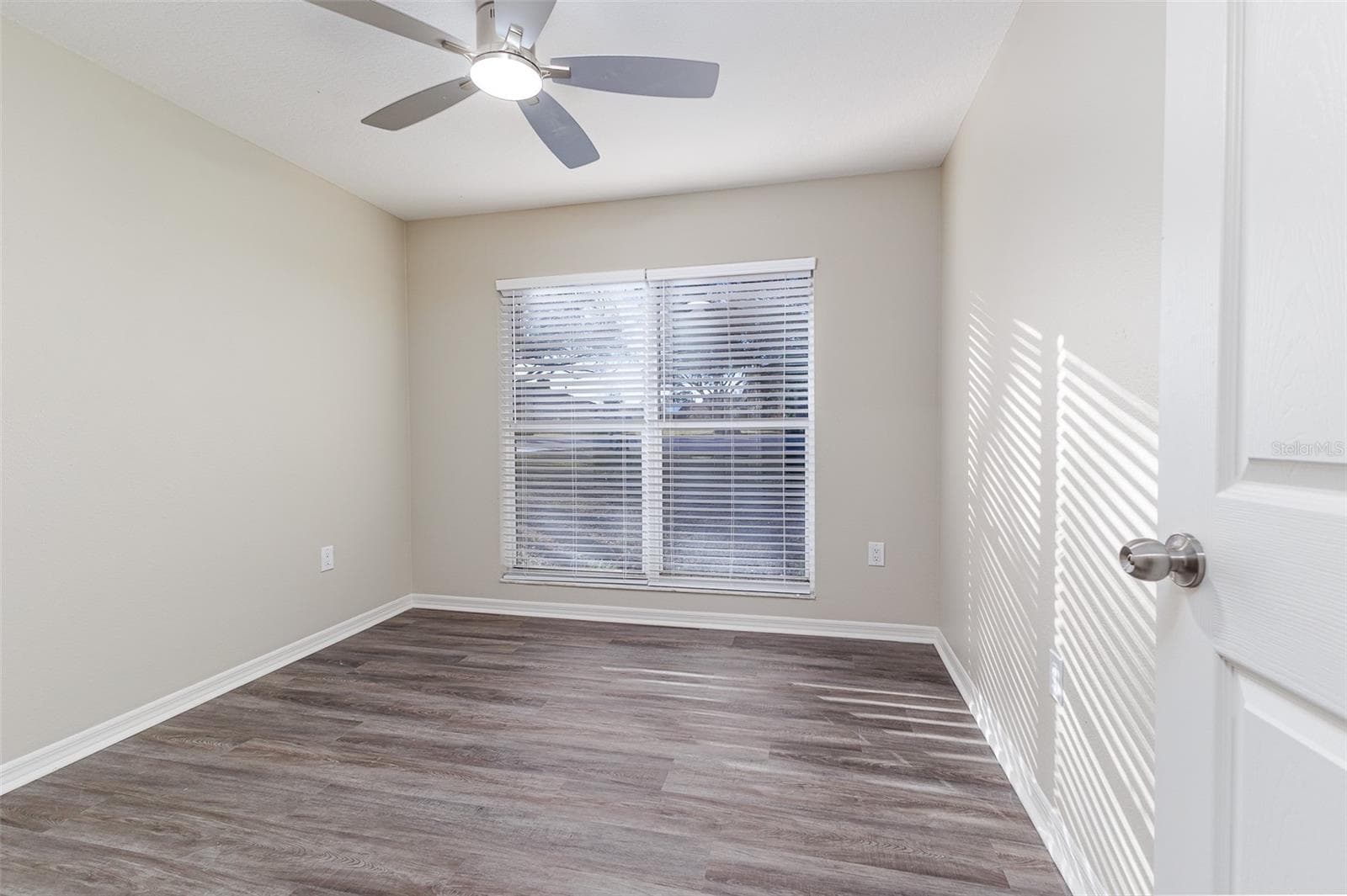 Bedroom 1 measures 10x10 - 411 EDGEWATER DR, POLK CITY