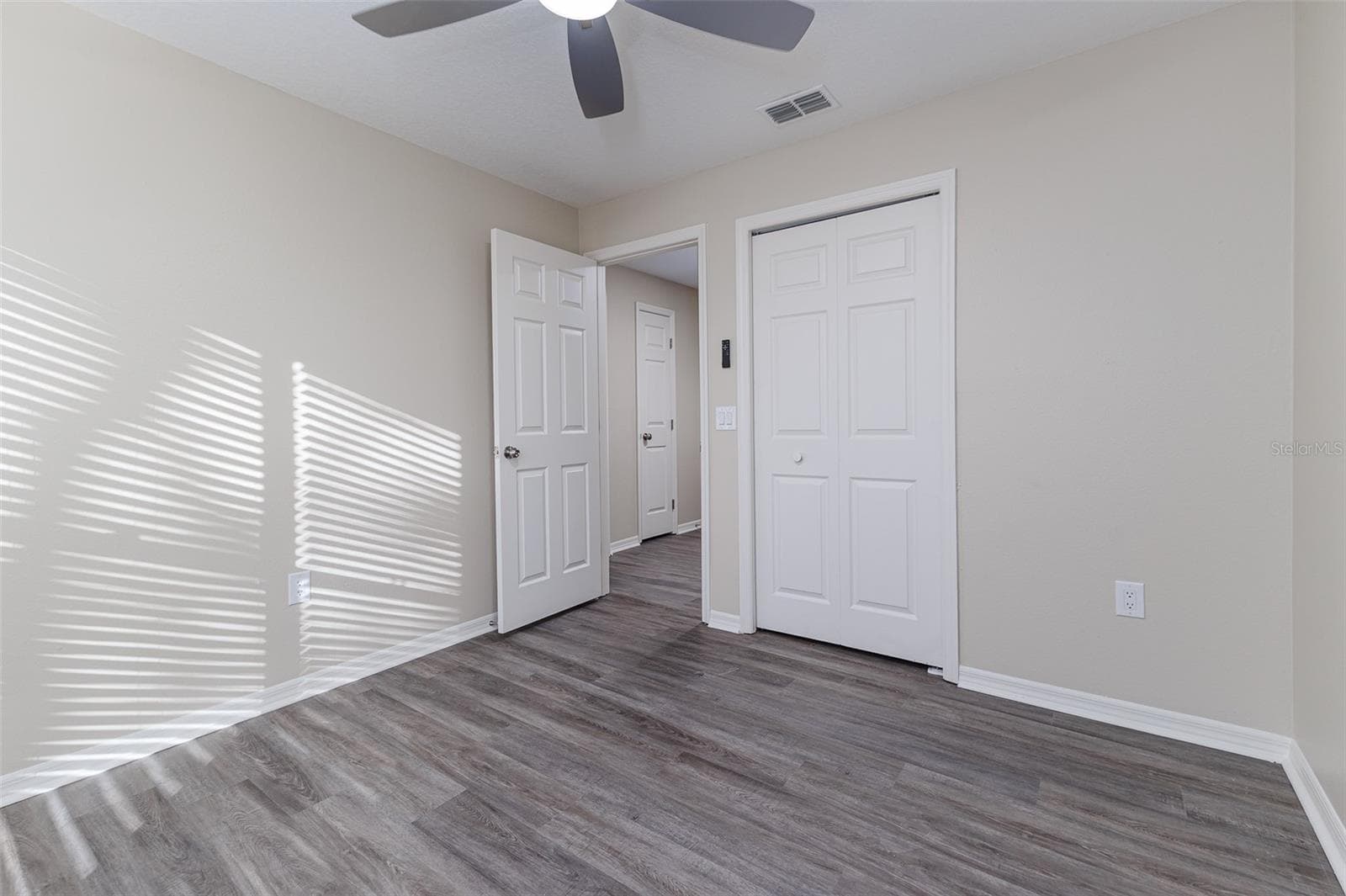 Bedroom 1 measures 10x10 - 411 EDGEWATER DR, POLK CITY