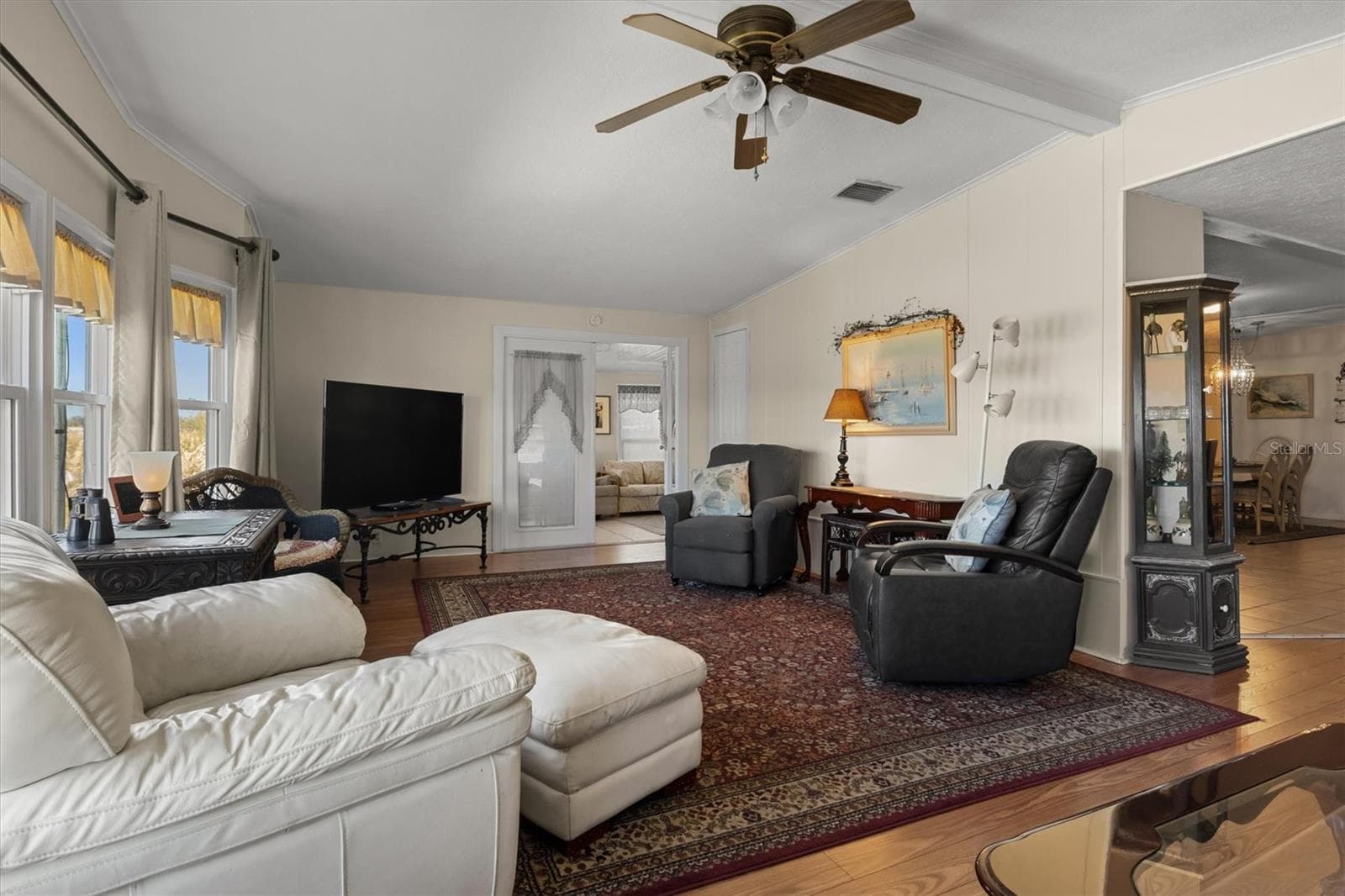 Living Room - Luxury Vinyl Laminate - 6825 S LAKE HENRY DR NE, WINTER HAVEN