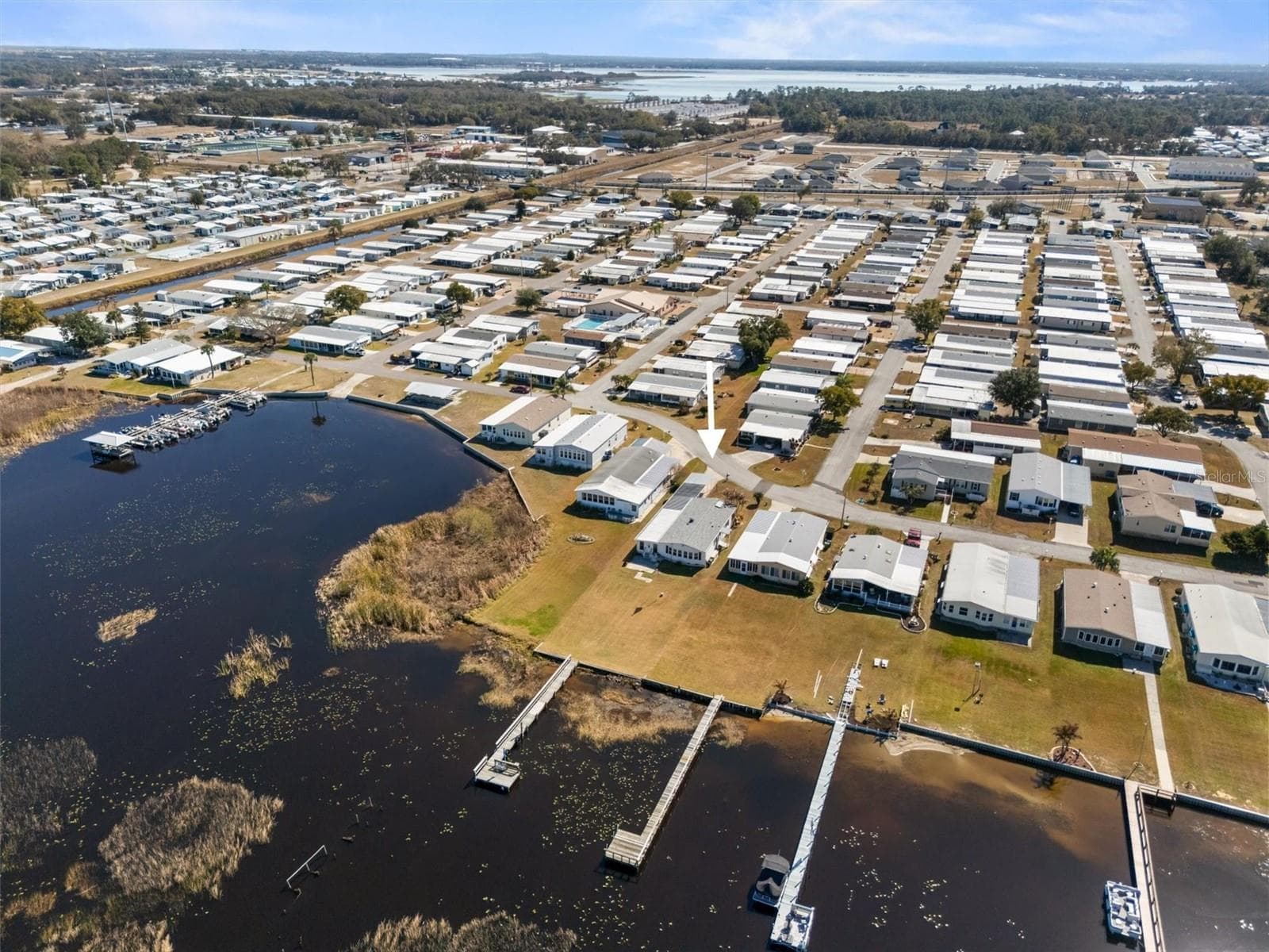 Aerial of the home and Lake Henry - 6825 S LAKE HENRY DR NE, WINTER HAVEN
