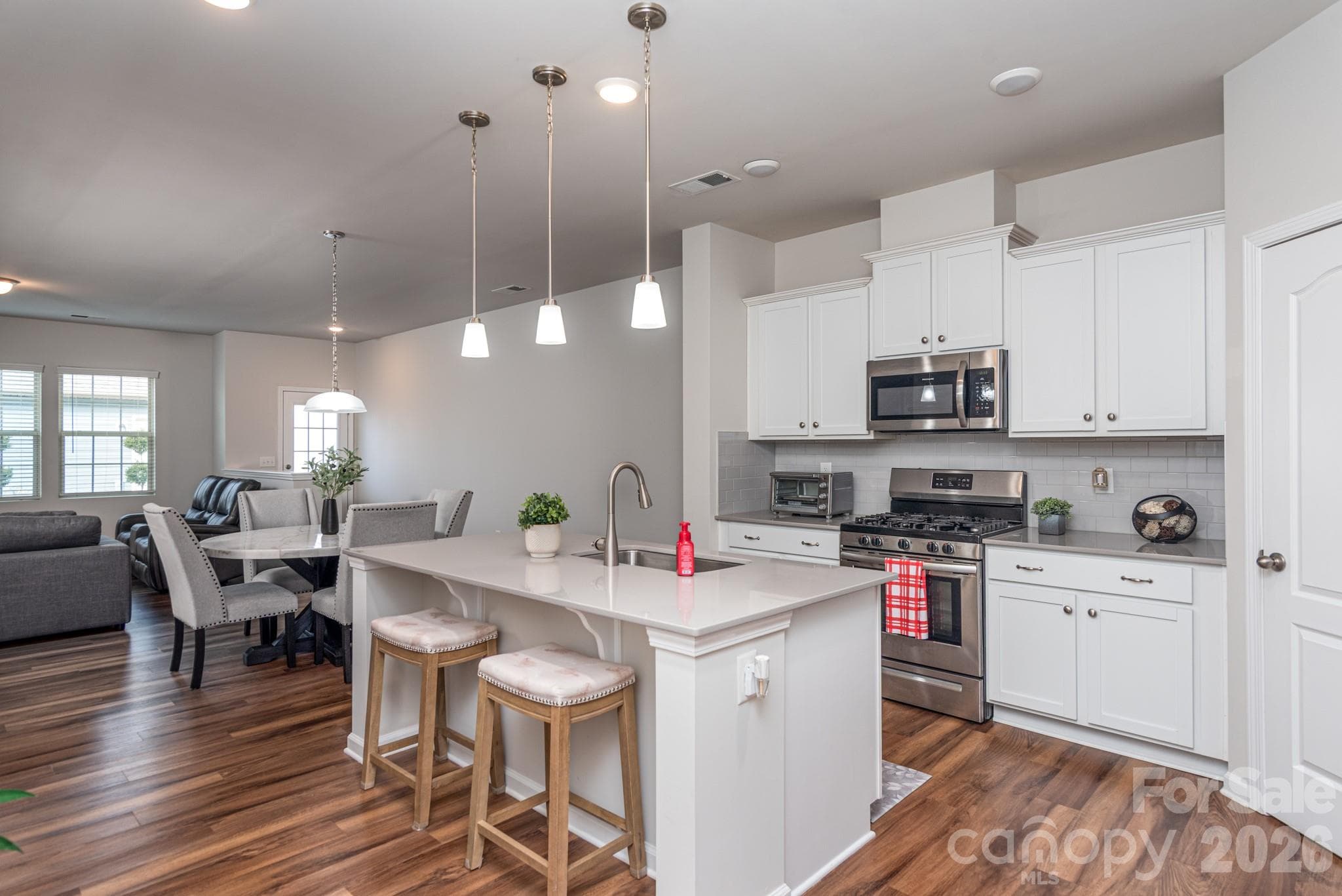 Kitchen opens to dining area and family room . Great flow for entertaining! - 11316 Westbranch Parkway, Davidson