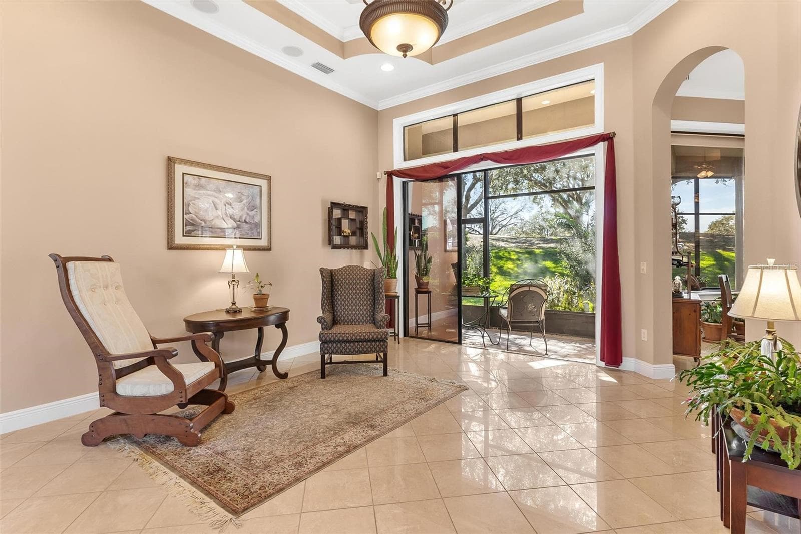 Spacious Living Room area lead to porch/ kitchen... - 26309 SAN GABRIEL, HOWEY IN THE HILLS