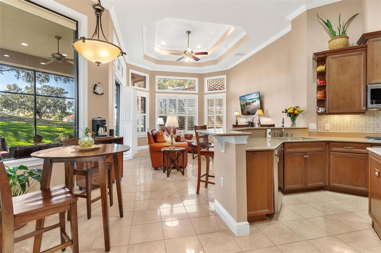Spacious Kitchen/ Breakfast area and Family Room combo... - 26309 SAN GABRIEL, HOWEY IN THE HILLS