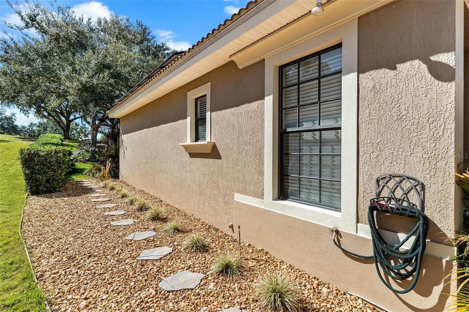 Manicured Lawn...side yard. - 26309 SAN GABRIEL, HOWEY IN THE HILLS