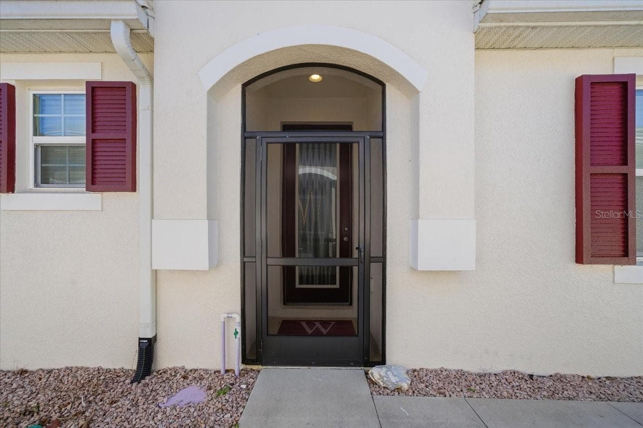 Front Door - 10591 HERON HIDEAWAY LOOP, LAND O LAKES