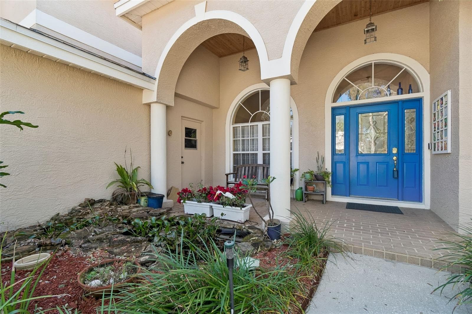 Extended brick covered front porch - 928 OAKVIEW RD, TARPON SPRINGS