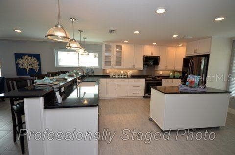 Professionally Staged Photo of Kitchen taken after renovation - 6408 7TH AVE N, ST PETERSBURG