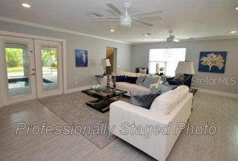 Professionally Staged Photo of Living Area taken after renovation - 6408 7TH AVE N, ST PETERSBURG