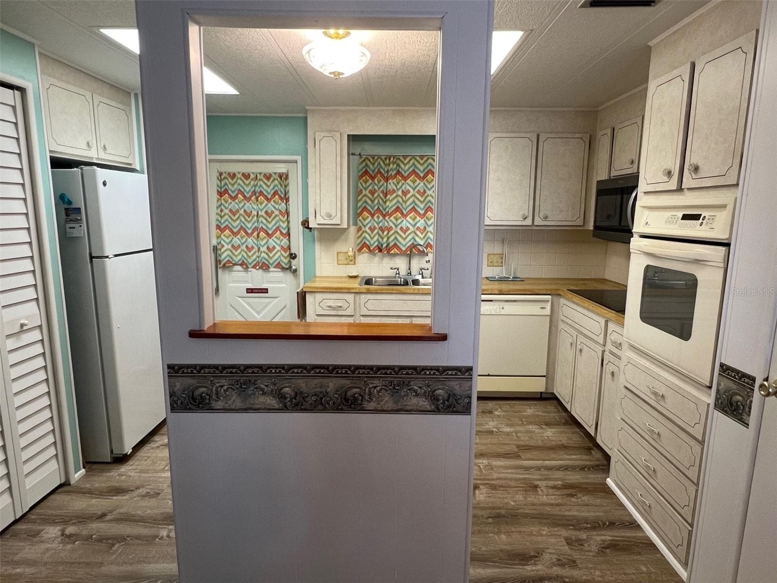 Manufactured Home at 709 SUGAR PALM ST, LARGO, photo 11 of 34