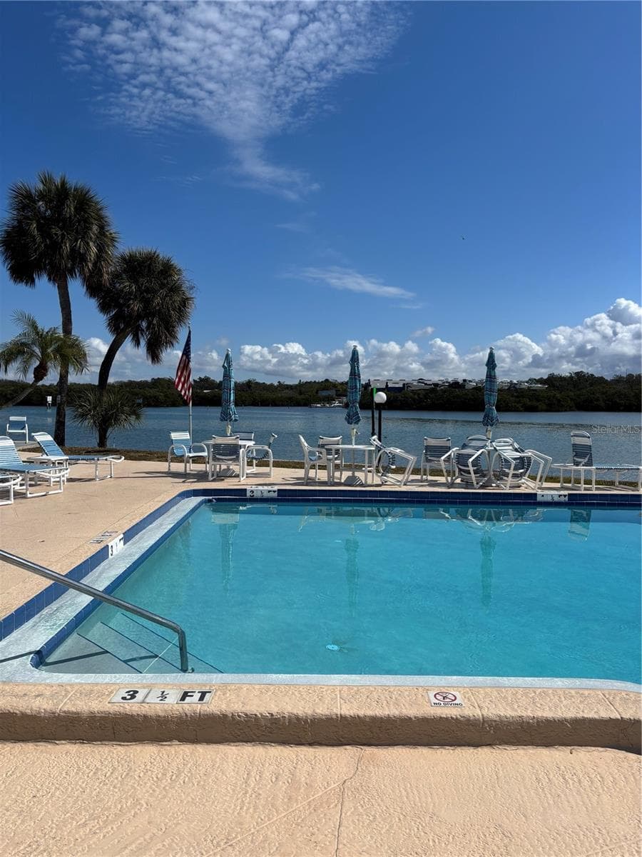 Beautiful pool area in this complex overlooks the intracoastal waterway - 1 WINDRUSH BLVD #24, INDIAN ROCKS BEACH