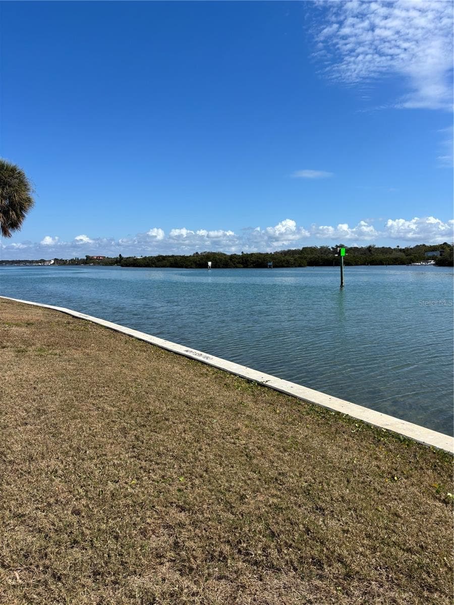 Pool and clubhouse face the intracoasal waterway - 1 WINDRUSH BLVD #24, INDIAN ROCKS BEACH
