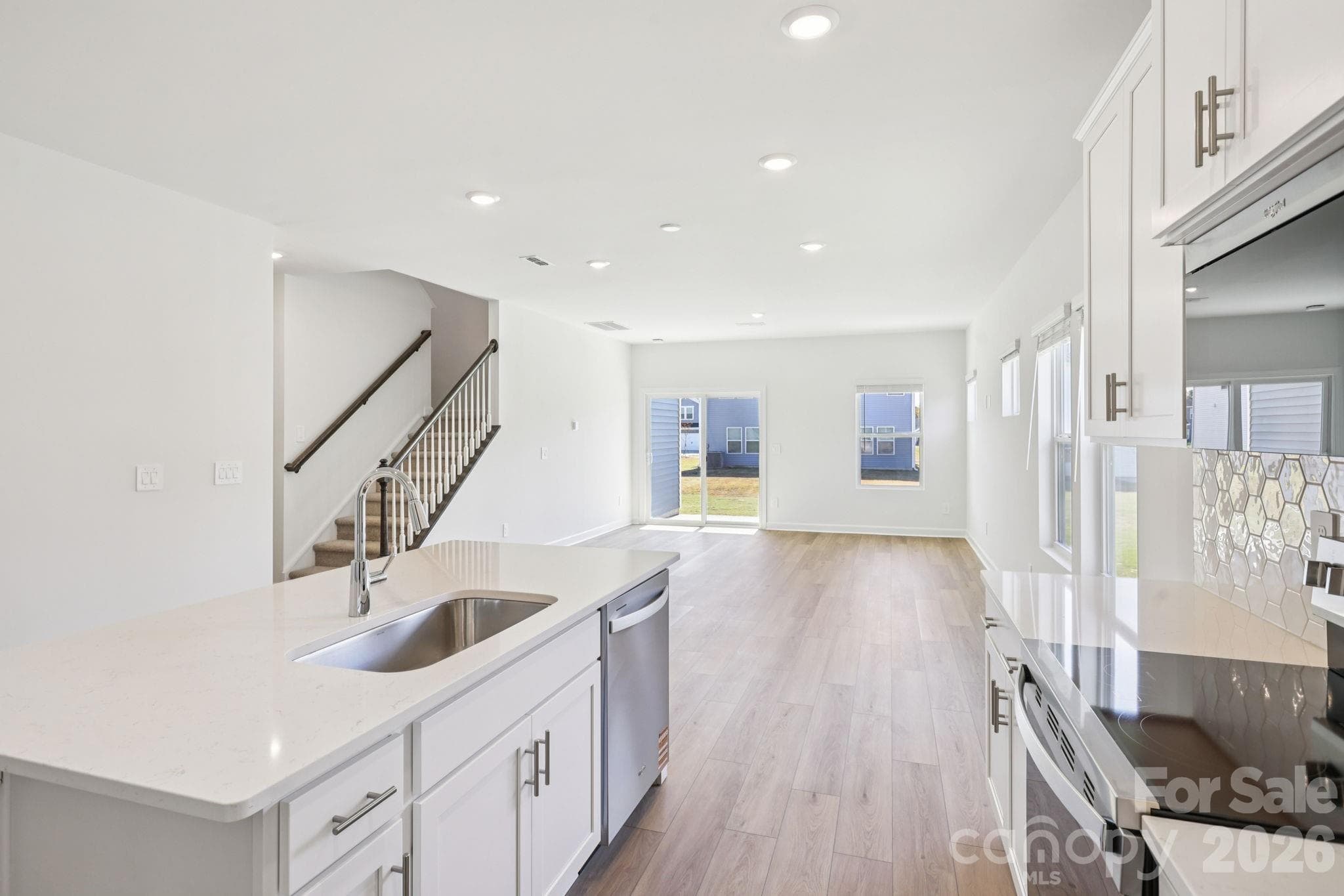 Photo is not of the actual home but is an inspirational photo of builder’s model home and may depict options, furnishings, and/or decorator features that are not included. - 1419 Blue Jay Street, Newton