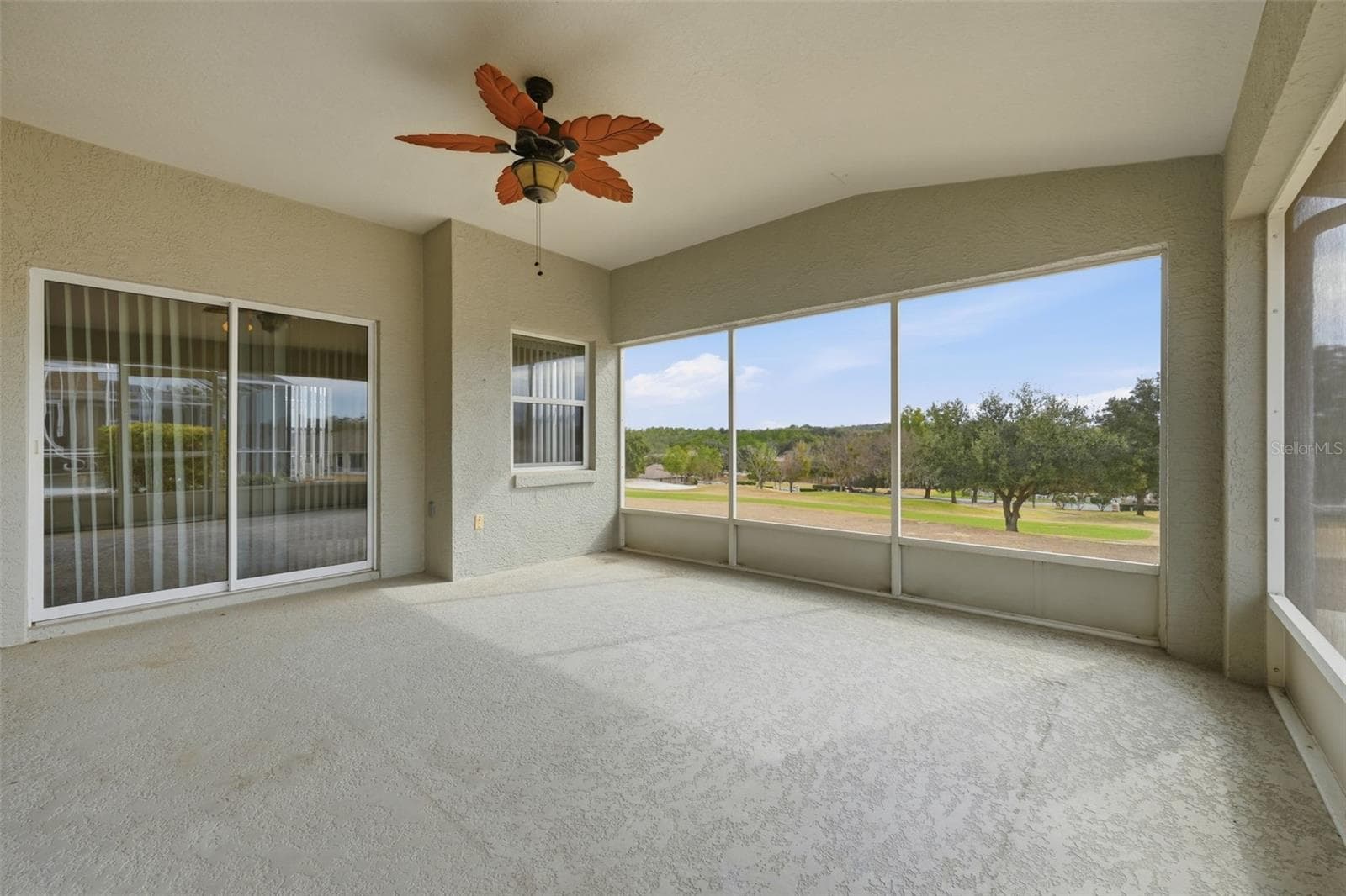 Lanai with sliders from primary bedroom - 2311 N ANDREA PT, LECANTO