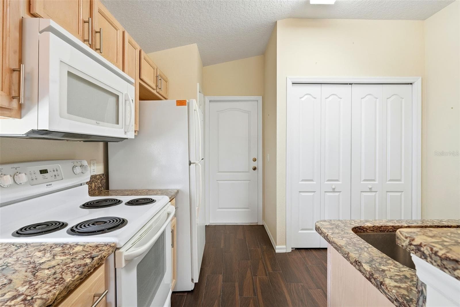 Kitchen has pantry closet and closet for washer/dryer...included! - 2311 N ANDREA PT, LECANTO