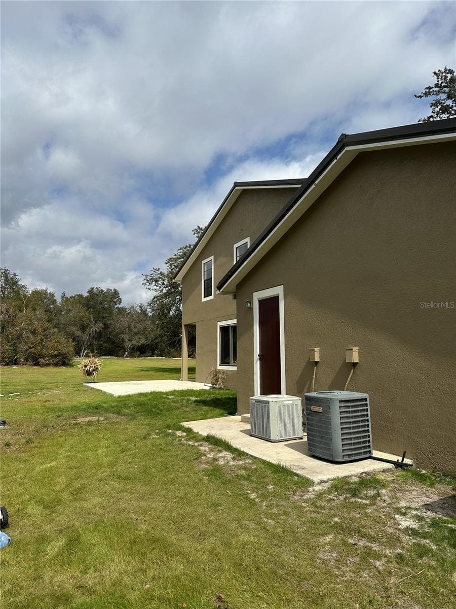 LEFT SIDE OF HOME - 2598 ENTERPRISE OSTEEN RD, OSTEEN