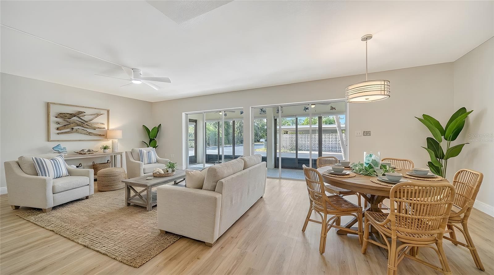 Living Room virtually staged. - 101 WHISPERING SANDS DR #107, SARASOTA