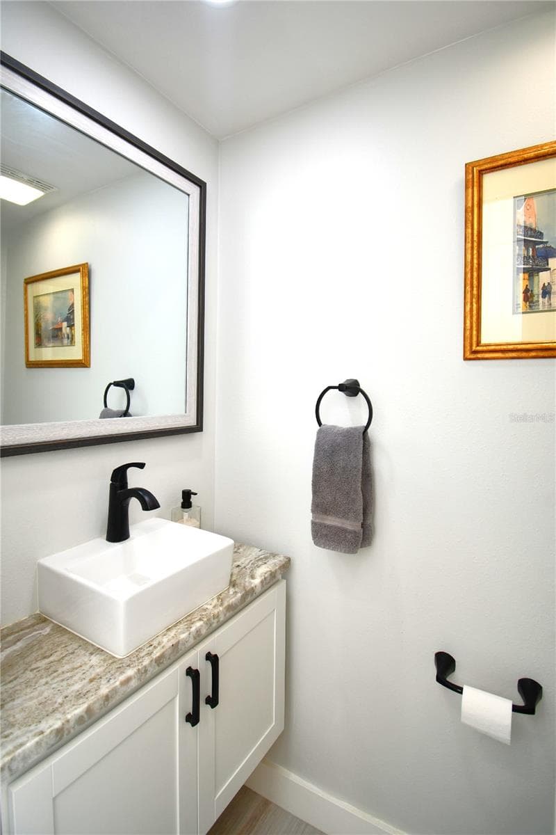Half Bath - Located in Laundry Room - 1245 N ALEXANDER ST, MOUNT DORA