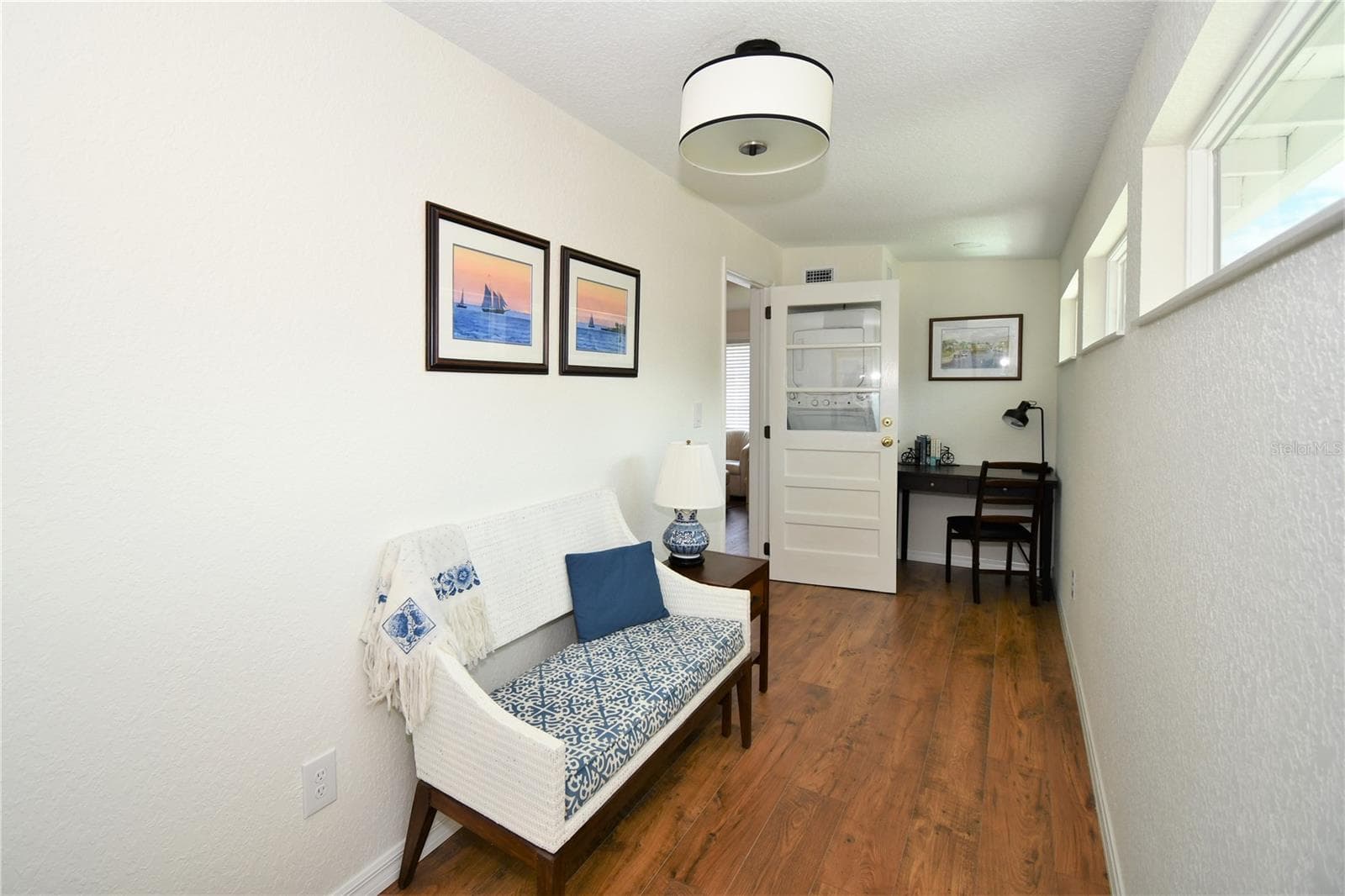 Apartment Front Porch, Office Area and Laundry Facilities - 1245 N ALEXANDER ST, MOUNT DORA
