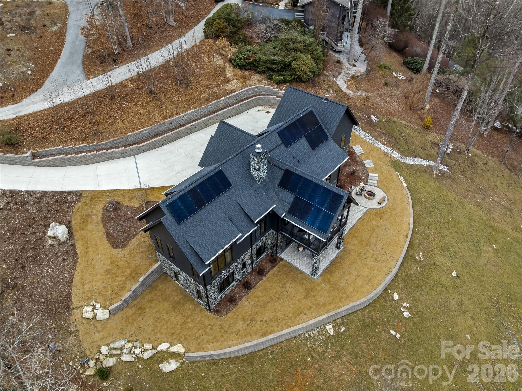 Aerial view highlighting the home’s circular drive and expansive outdoor living areas - 241 Tower Circle, Hendersonville