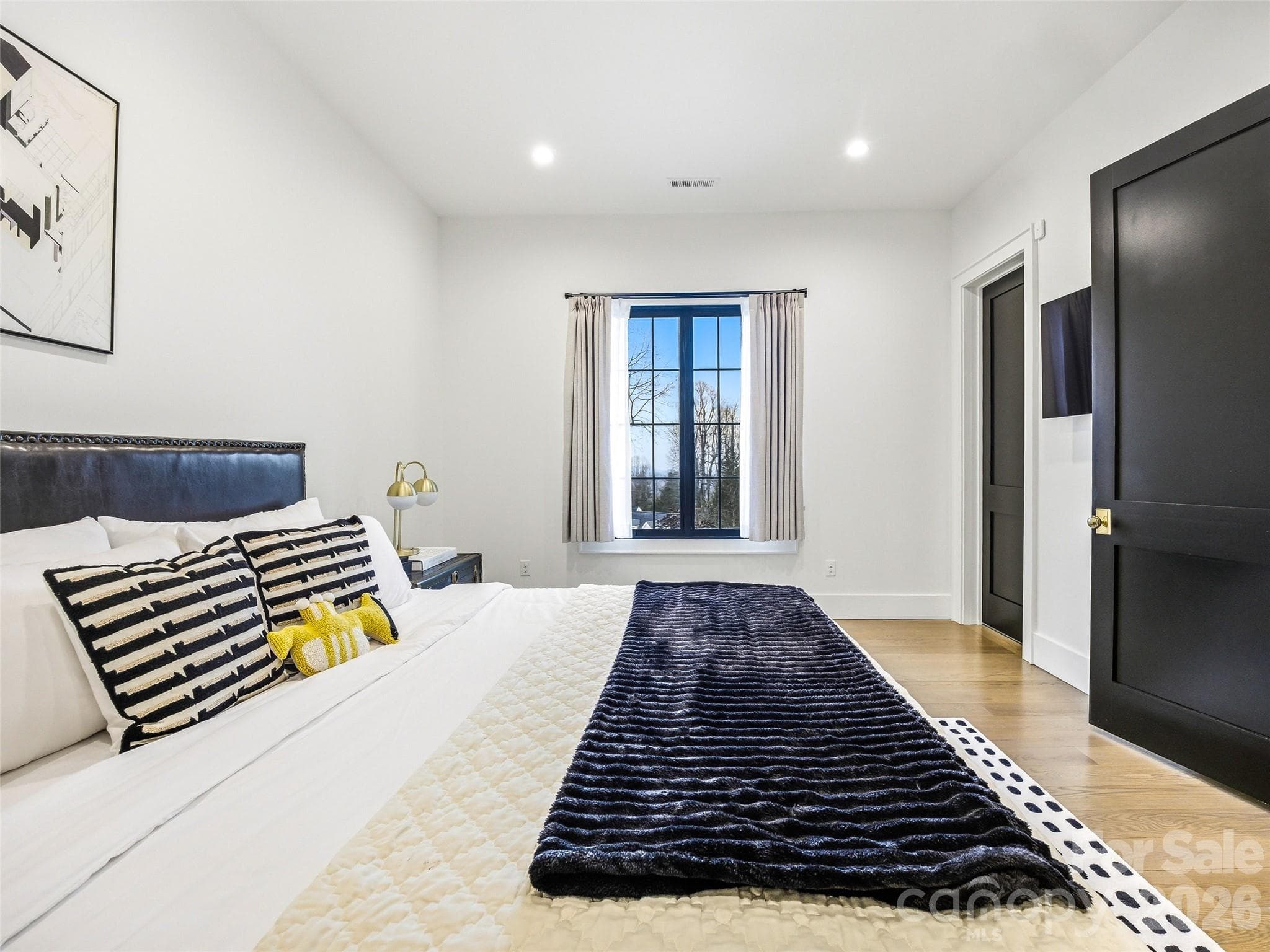 Spacious guest room with modern finishes and generous closet space - 241 Tower Circle, Hendersonville