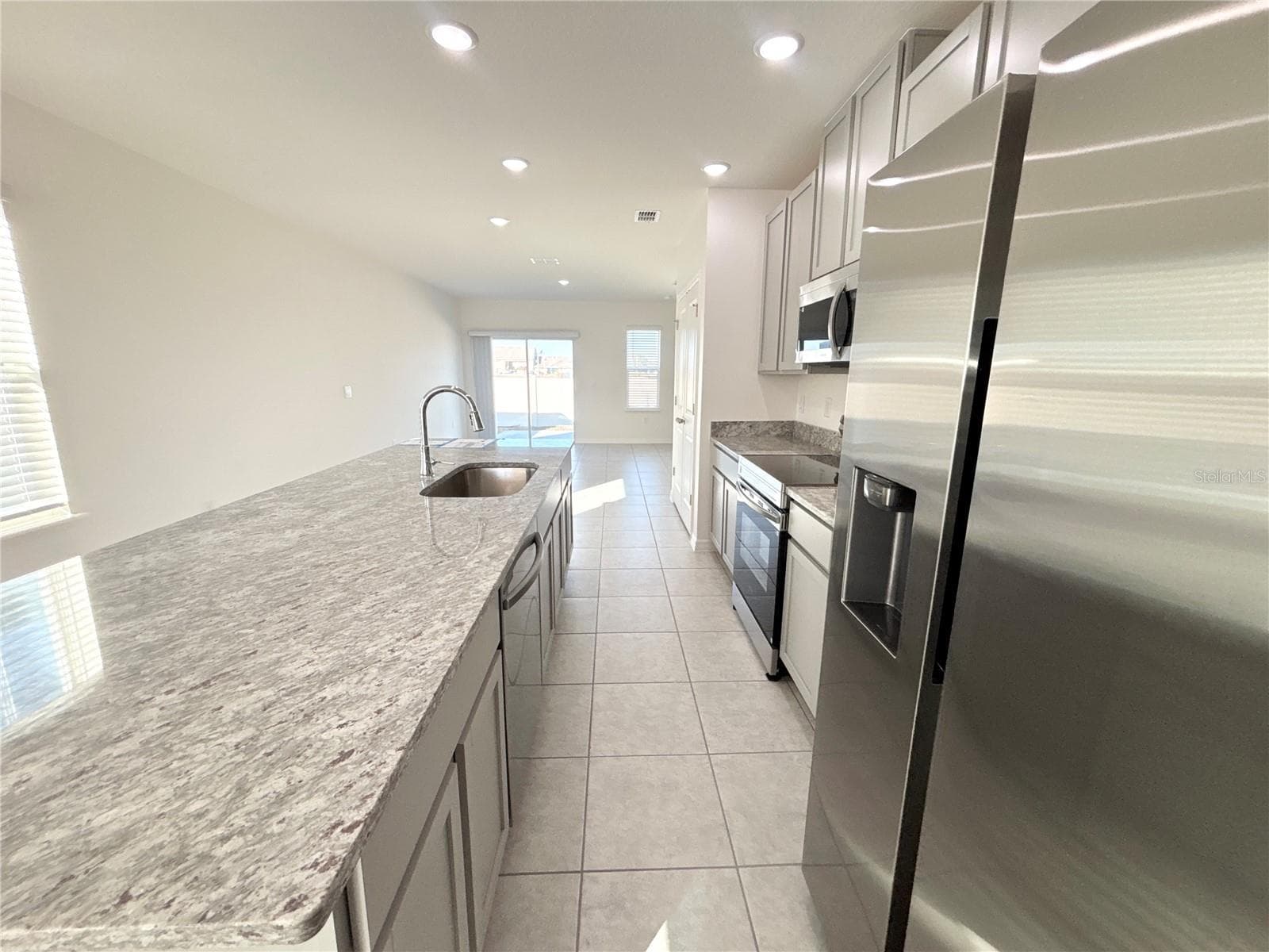 Stainless Appliances and Granite Countertops - 3844 BLUETHREAD WAY, POINCIANA