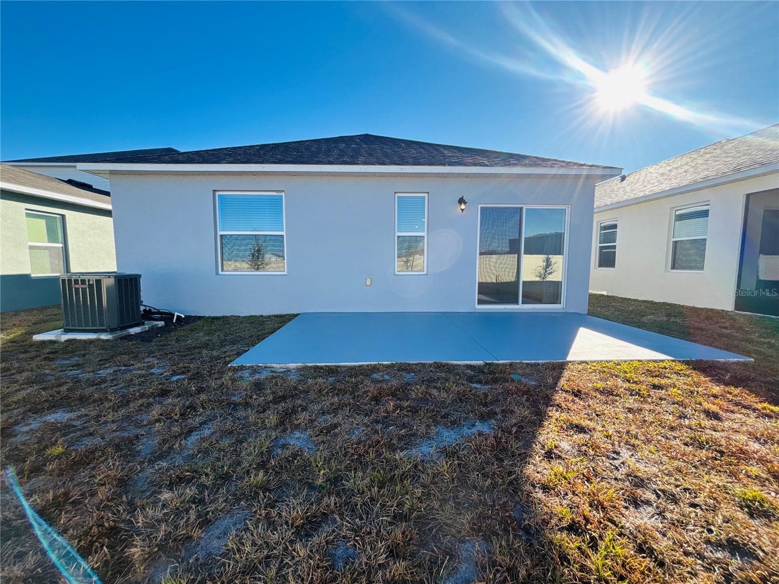 Rear View with Extended Patio - 3844 BLUETHREAD WAY, POINCIANA