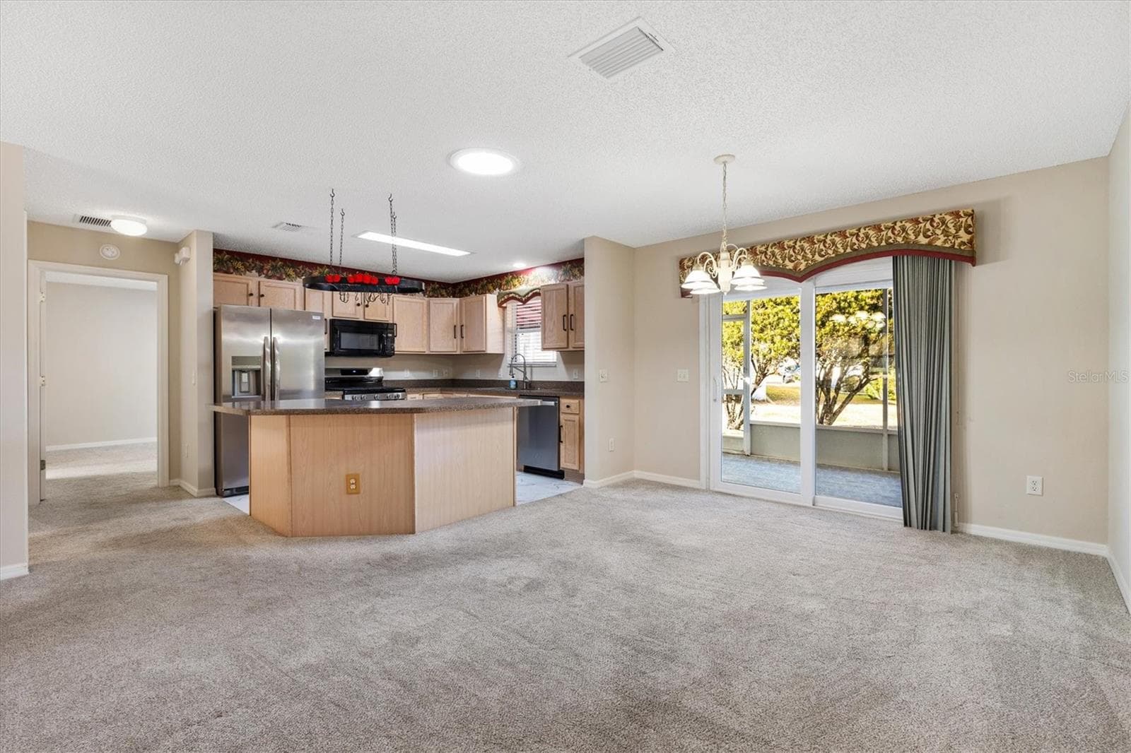 Looking into Dining Room and Kitchen - 9711 SE 171ST ARGYLL ST, THE VILLAGES