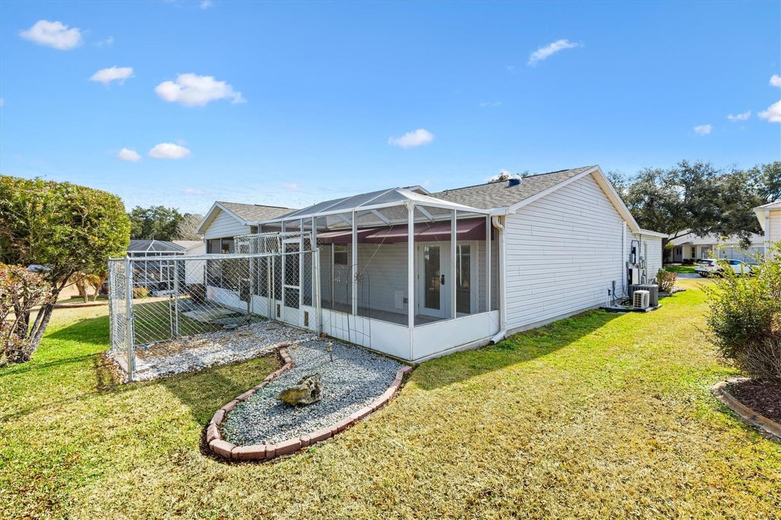 Backyard showing Outdoor Pet Cage - 9711 SE 171ST ARGYLL ST, THE VILLAGES