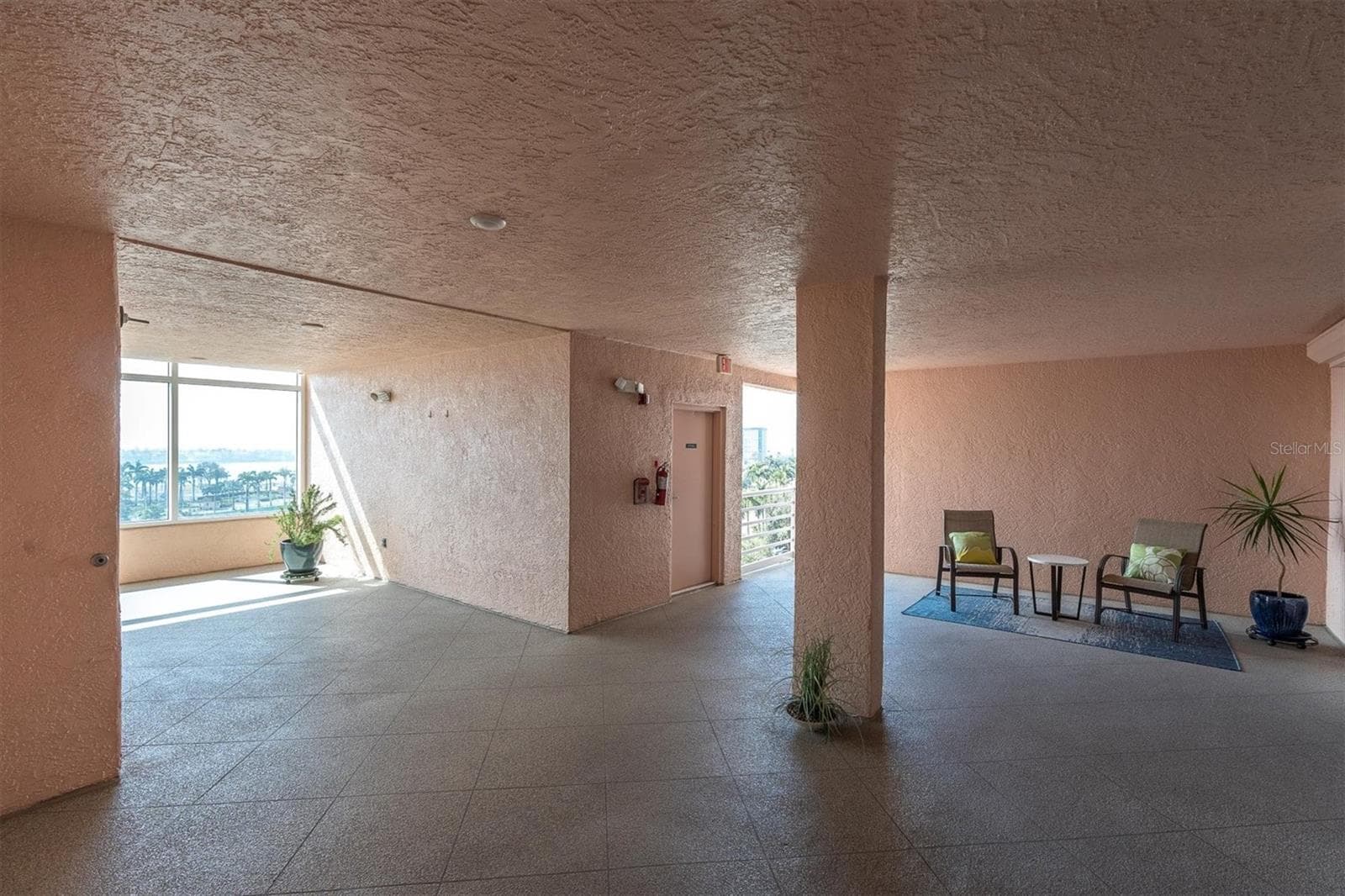 Private Terrace off elevator faces front of building - 4993 BACOPA LN S #705, ST PETERSBURG