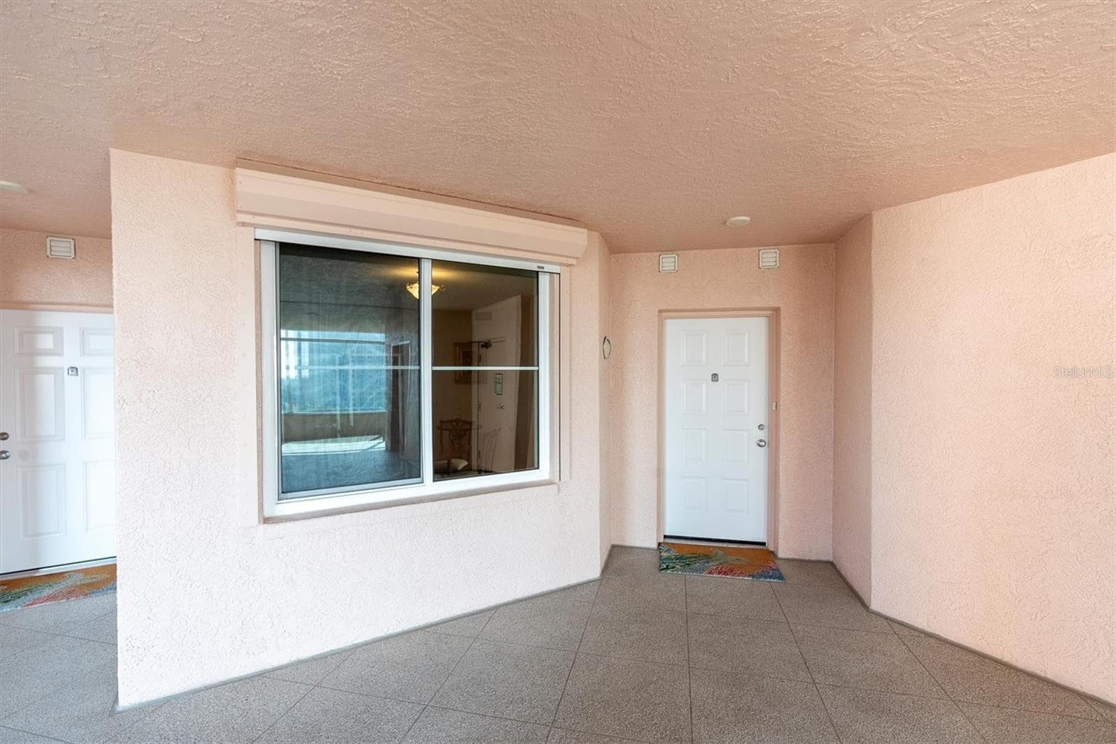 Front door entry - 4993 BACOPA LN S #705, ST PETERSBURG