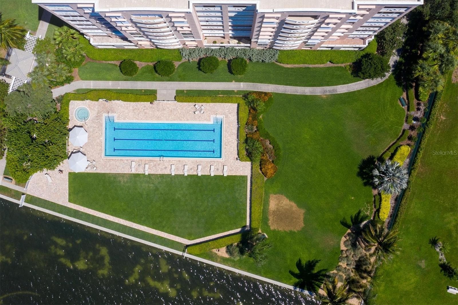 Aerial view of community pool - 4993 BACOPA LN S #705, ST PETERSBURG