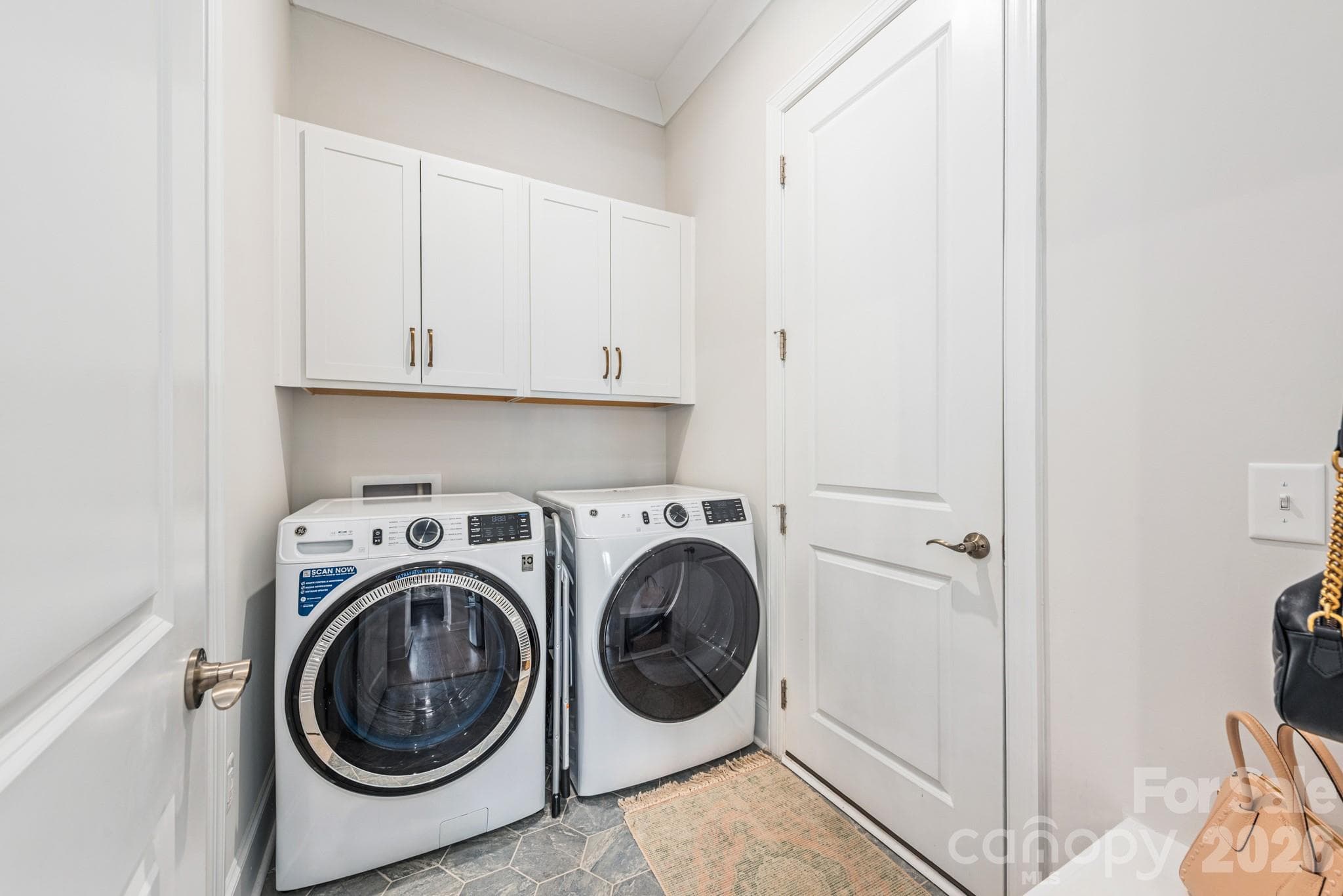 Exiting Primary Bathroom/ Entering into Mudroom-Washer & Dryer Room, Next to Garage - Everton, Charlotte