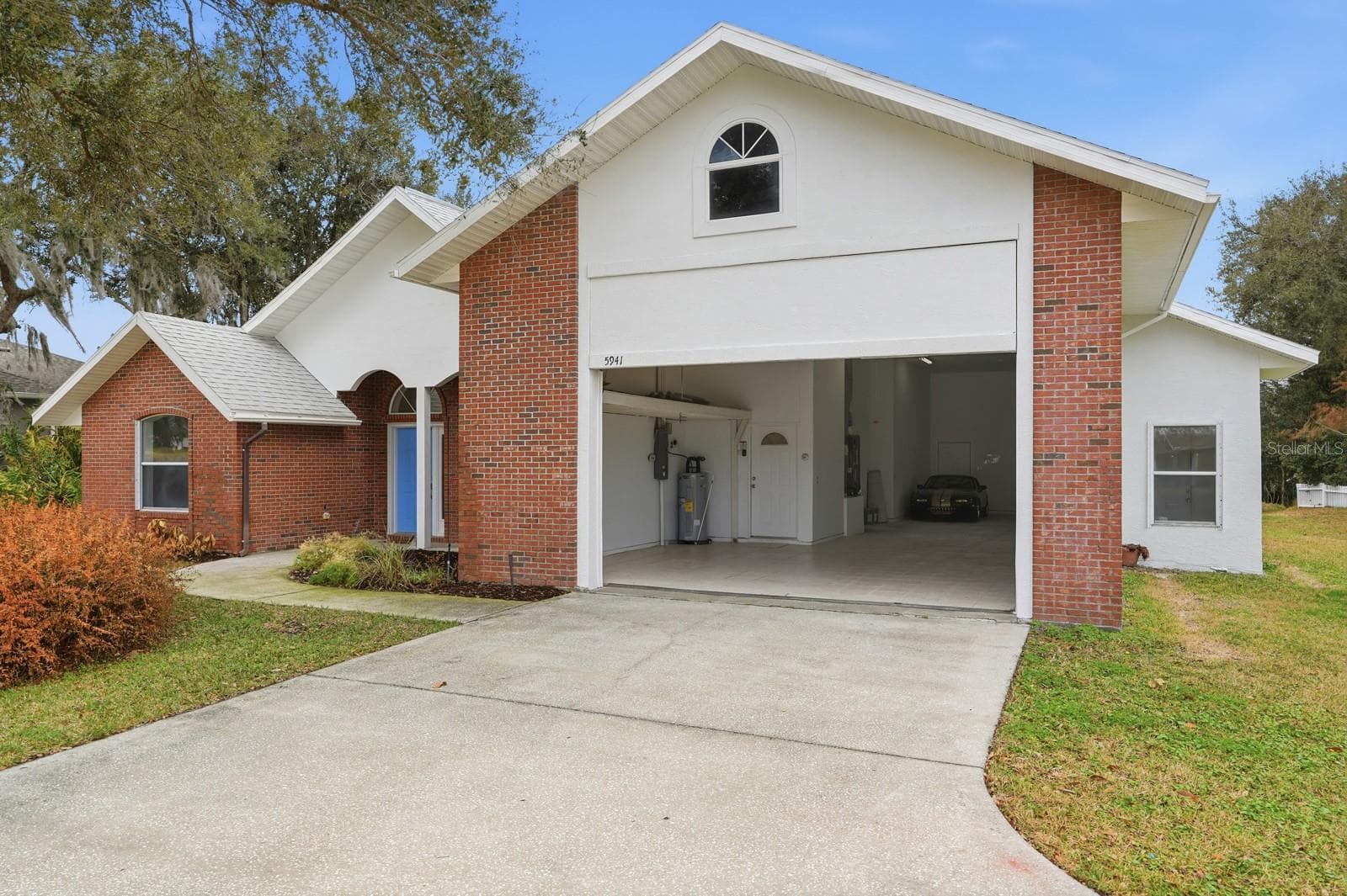 Garage open to almost 14 feet. - 5941 MARVILLE CIR, PORT ORANGE