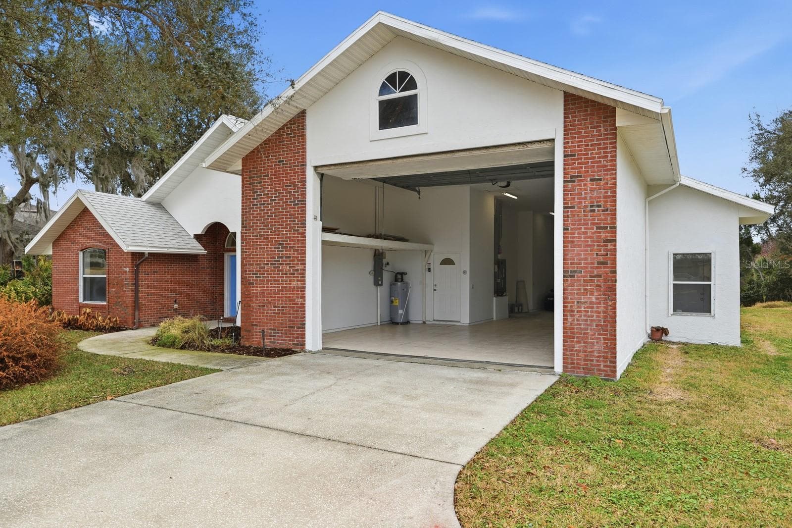 Garage open to almost 14 feet. - 5941 MARVILLE CIR, PORT ORANGE