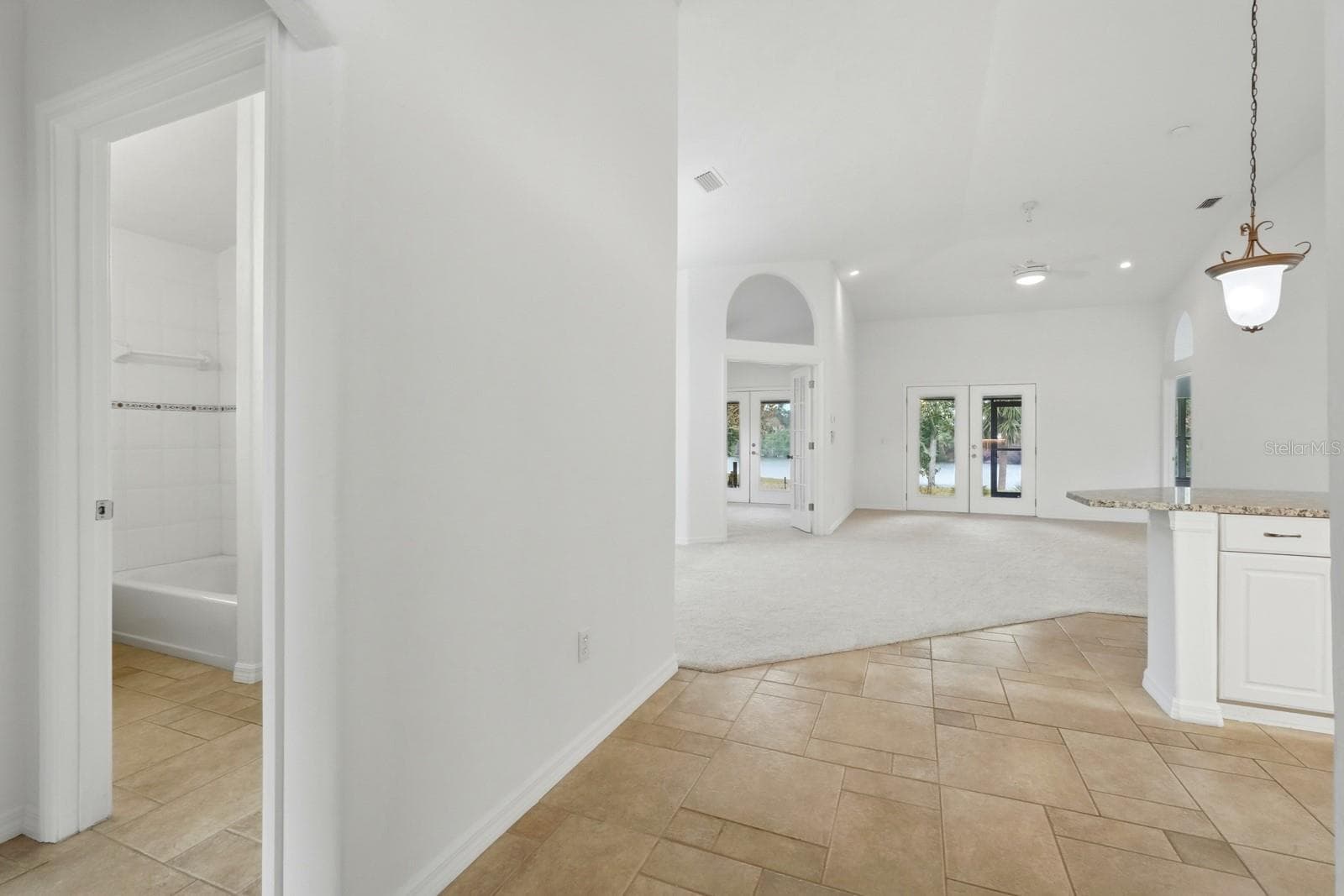 Coming into the Living room/Kitchen - 5941 MARVILLE CIR, PORT ORANGE