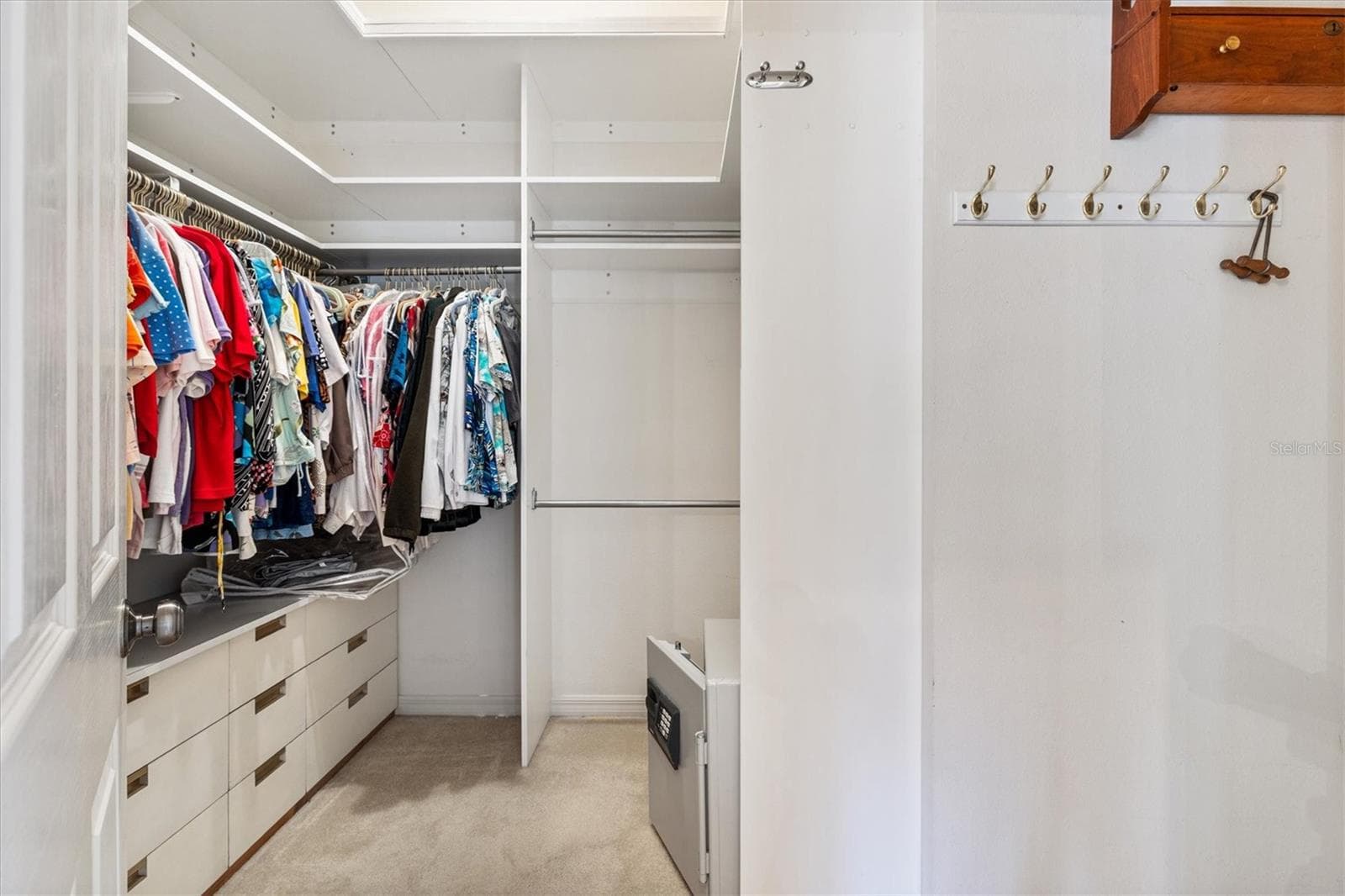 Main Bedroom Walk-In Closet with built in storage - 17723 SE 81ST TIMBERWOOD TERRACE, THE VILLAGES