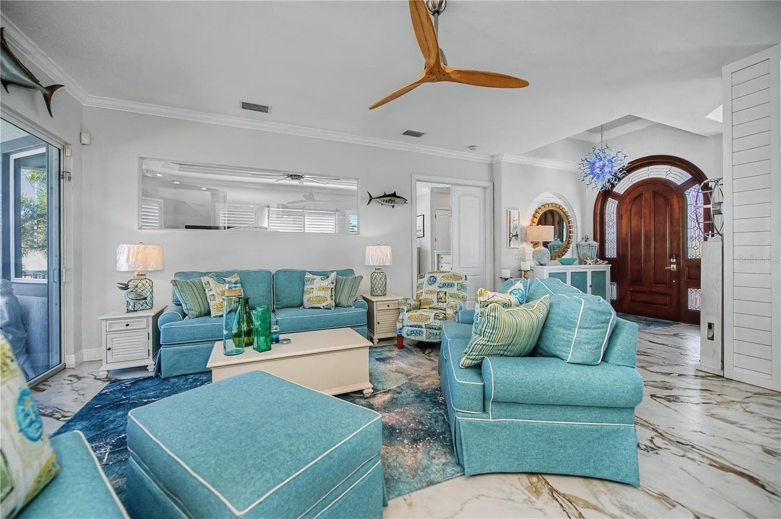 Living Room with Shiplap, New Tile Floors and Views across Canal - 290 TAIT TER SE, PORT CHARLOTTE