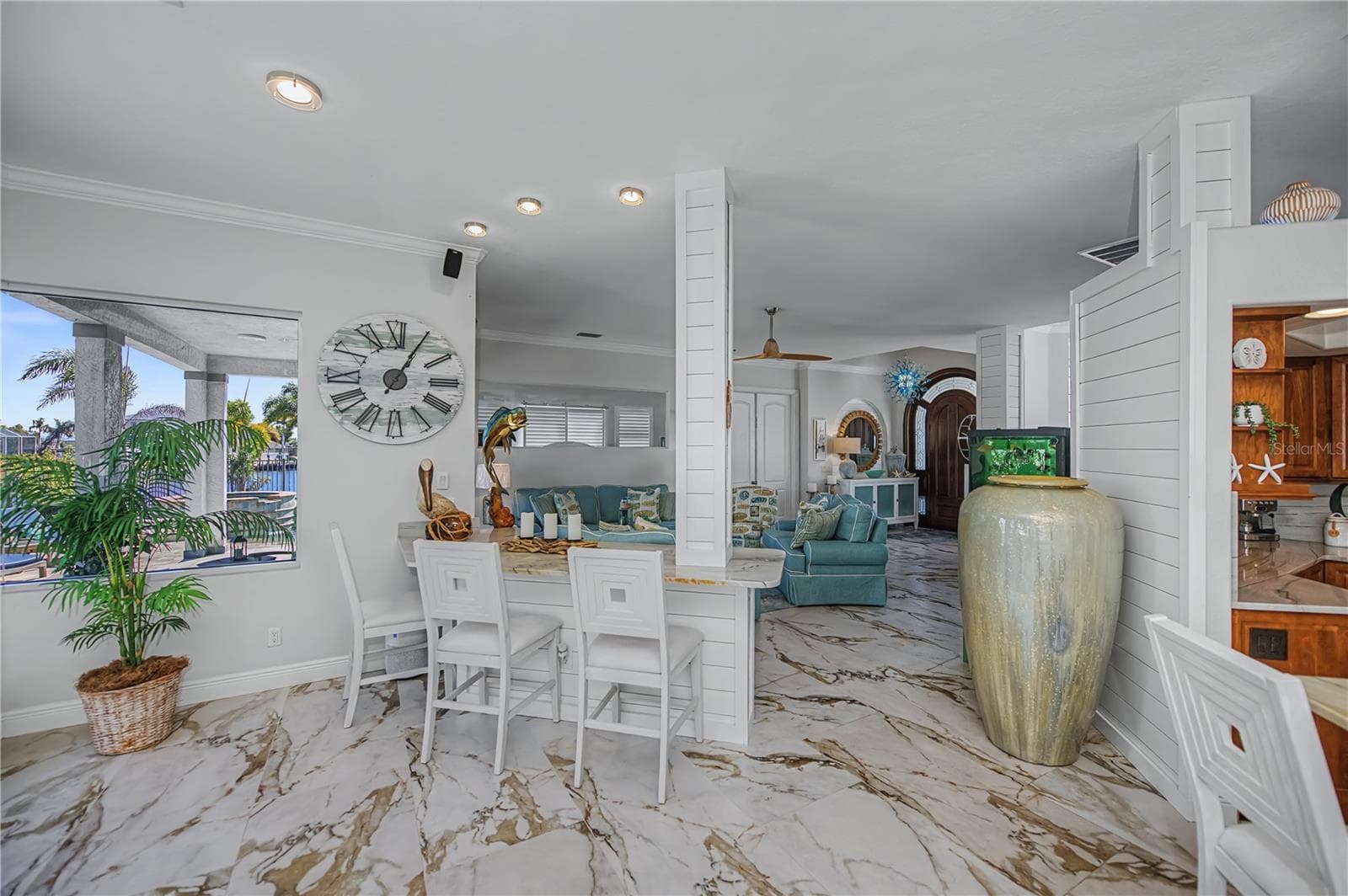 View from Family Room of Living Room and Small Breakfast Bar Area in between - 290 TAIT TER SE, PORT CHARLOTTE