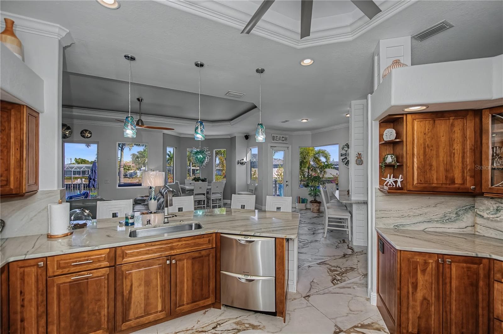 View of Breakfast Bar, Quartz Countertops with Real Wood Cabinetry, Built in Stainless Appliances - 290 TAIT TER SE, PORT CHARLOTTE